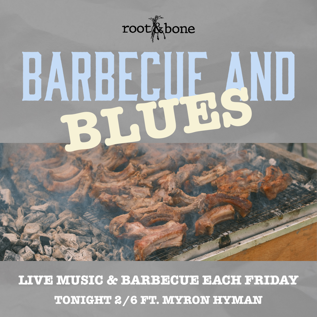 Grilled ribs on a barbecue grill with smoke