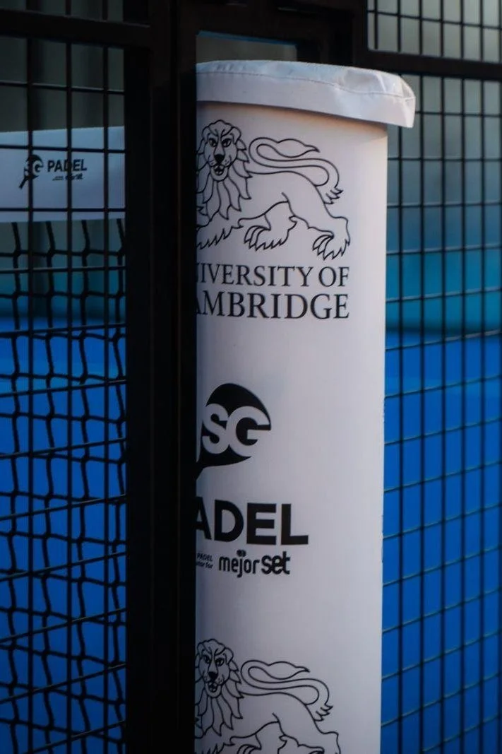Padel Court net with University of Cambridge logo and SG Padel Logo