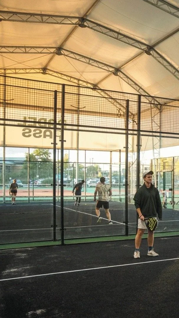Padel Court in Luton underneath a large white Canopy. The Padel Courts have black turf