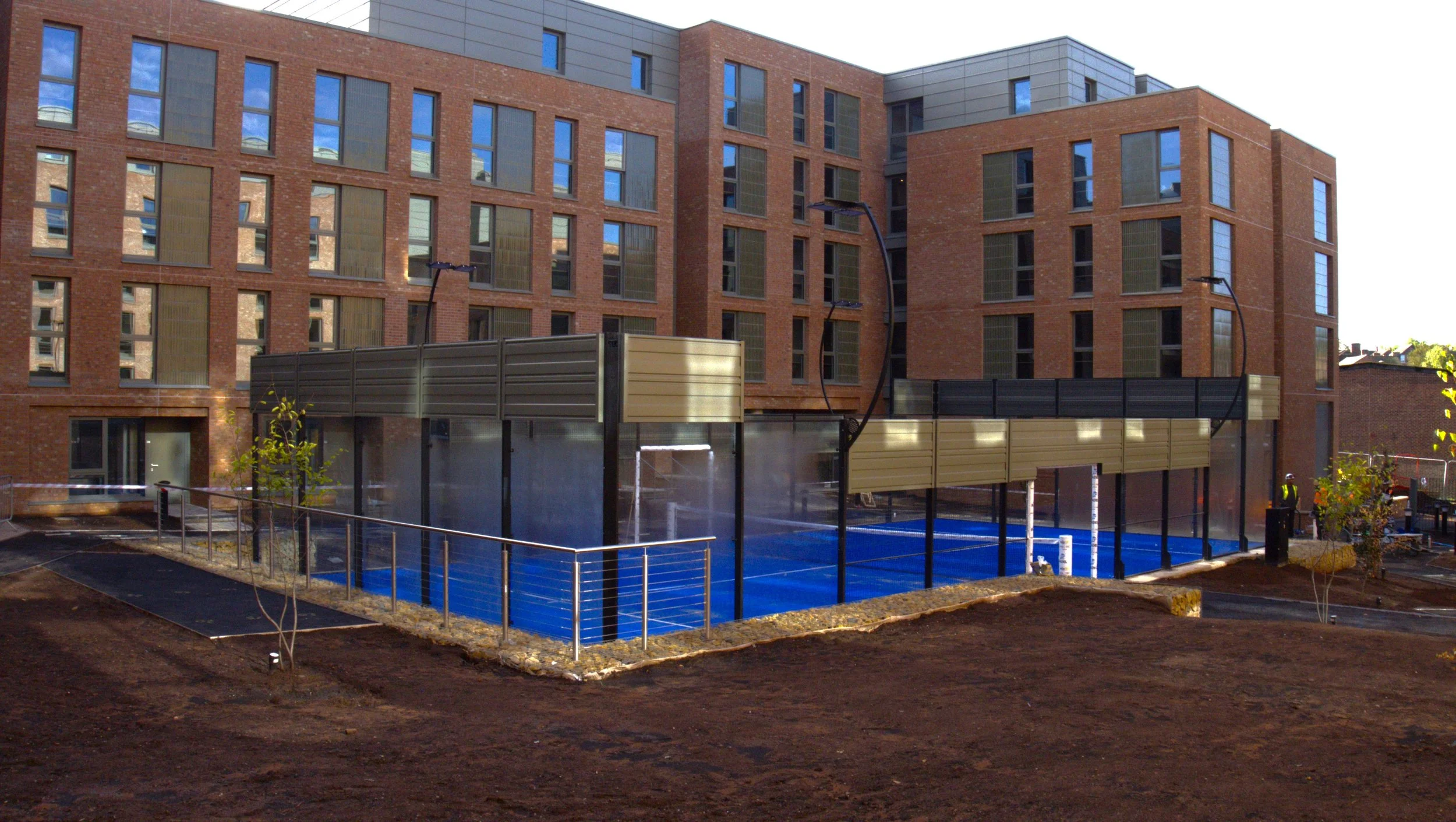A Padel Court inside of University Accommodation