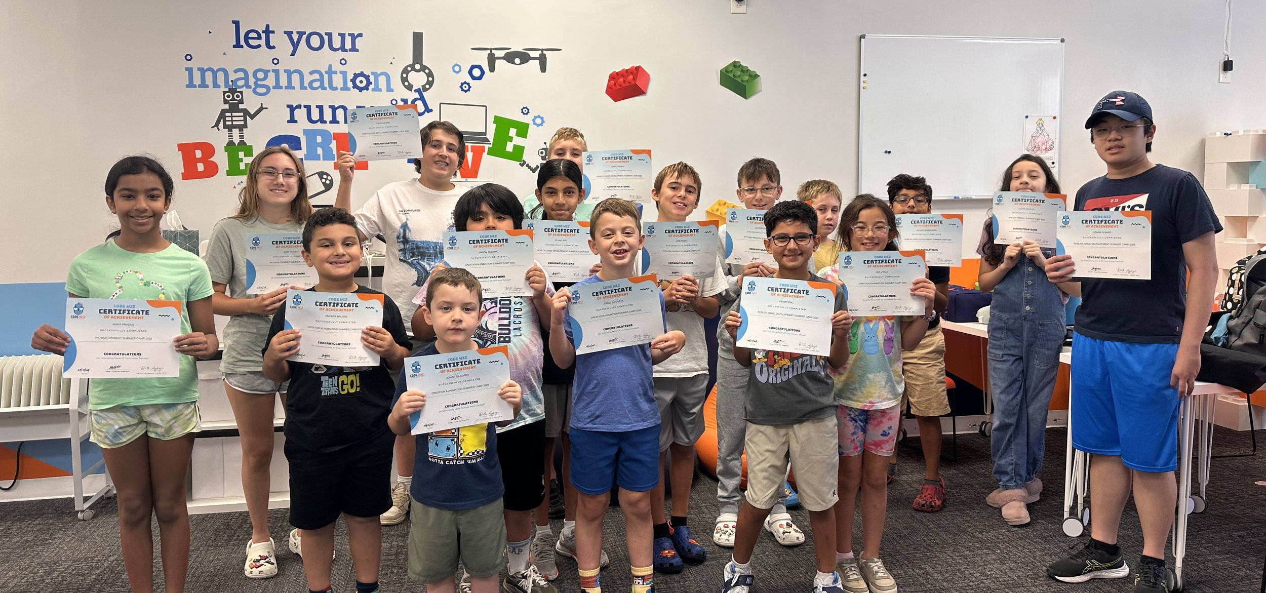 Kids celebrating at a coding summer camp in Rutherford, NJ — Code Wiz