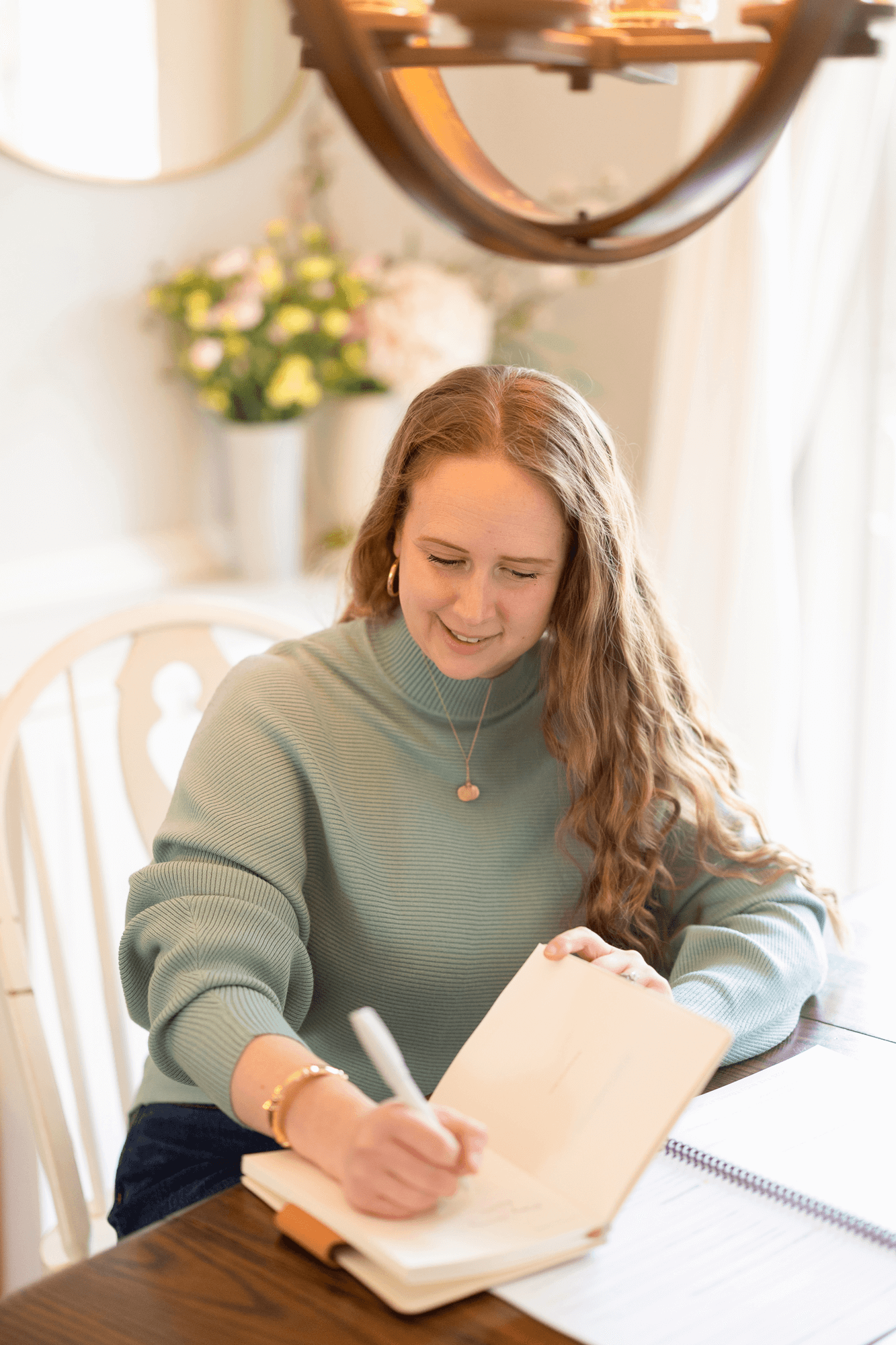 Mary Farrelly writes notes for her trauma-informed NICU support training with The NICU Translator.