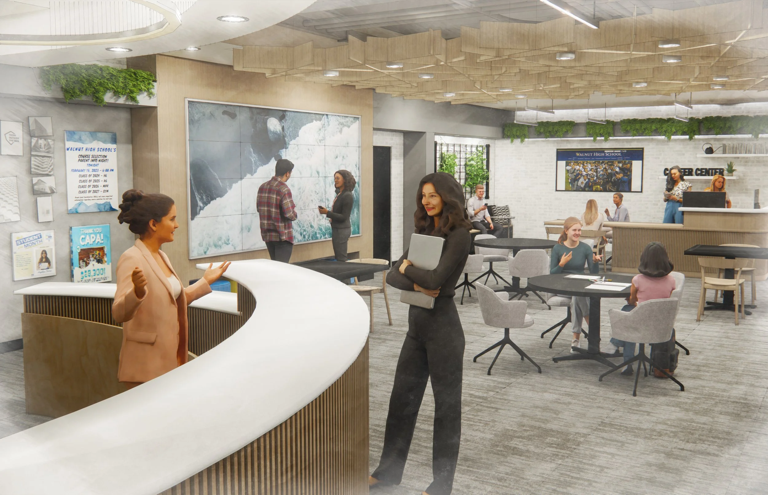 The lobby of Walnut High School's center with students and staff. A woman with dark, curly hair in a black dress stands with arms crossed, while another woman in a pink blazer talks at a white reception desk. Students are seated at round tables, some engaging in conversation or using devices. The background features a large wall-mounted screen and bulletin boards, with greenery hanging across the ceiling.