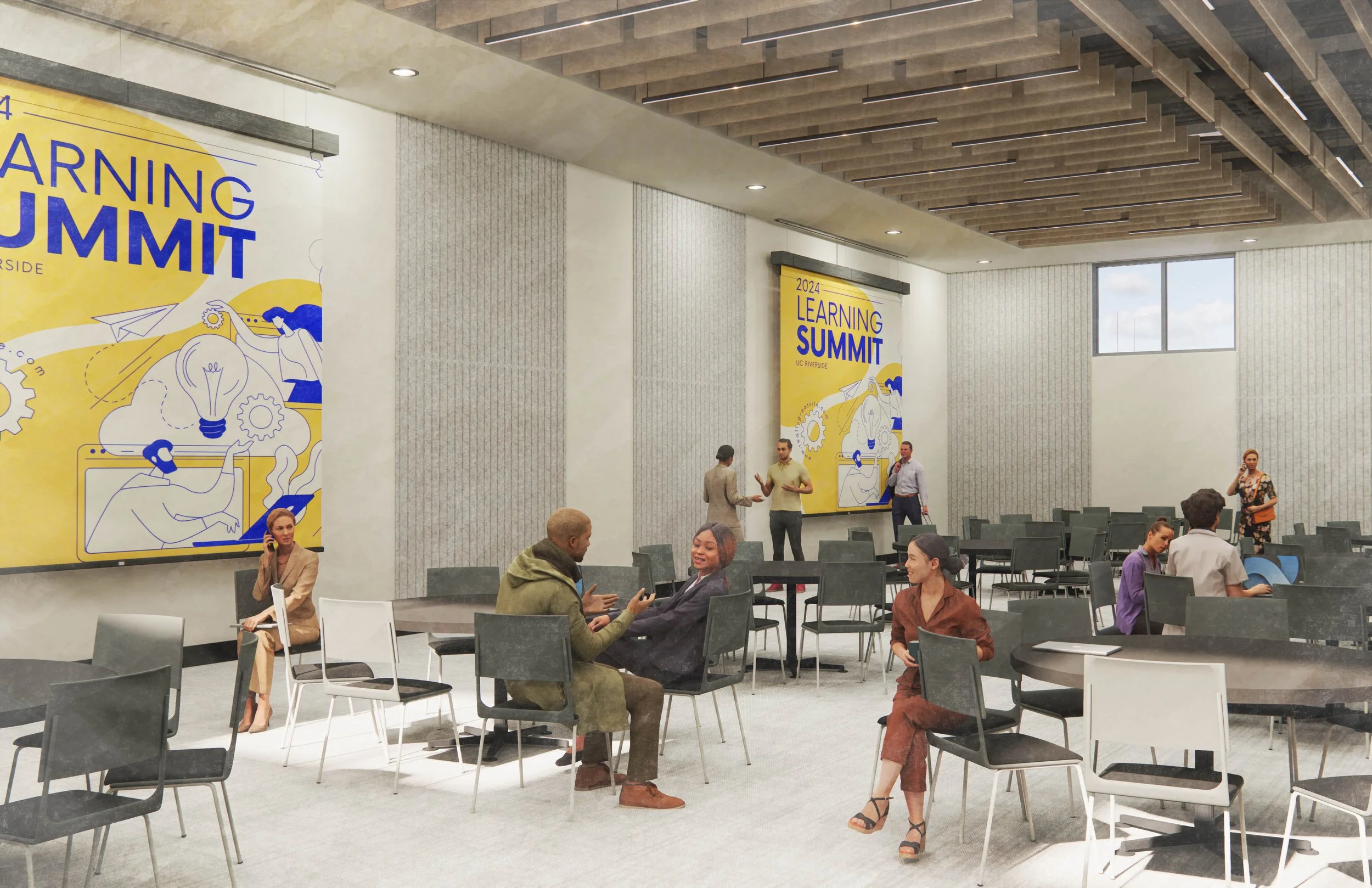 People sitting and talking in a conference room with banners that read '2024 Learning Summit' and 'UC Riverside' on the walls.