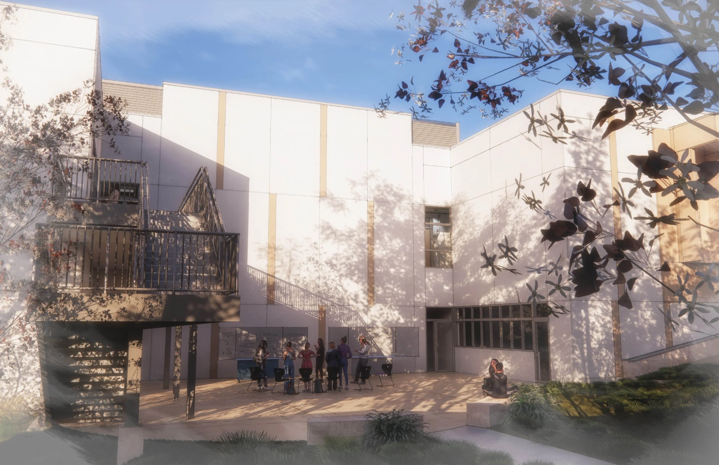 Students gathered outside a modern white building with shadows of trees cast on the wall, some sitting and some standing, with chairs and informational boards on display.