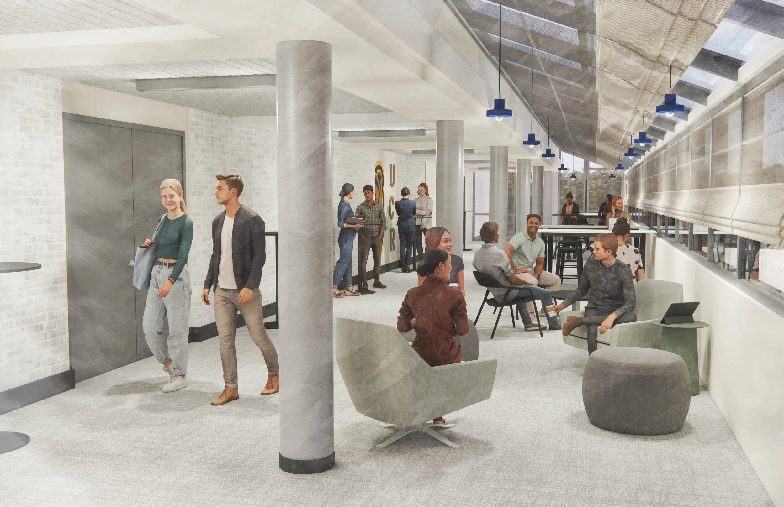 People inside a modern office lounge area with seating, large windows, and artwork on the walls.