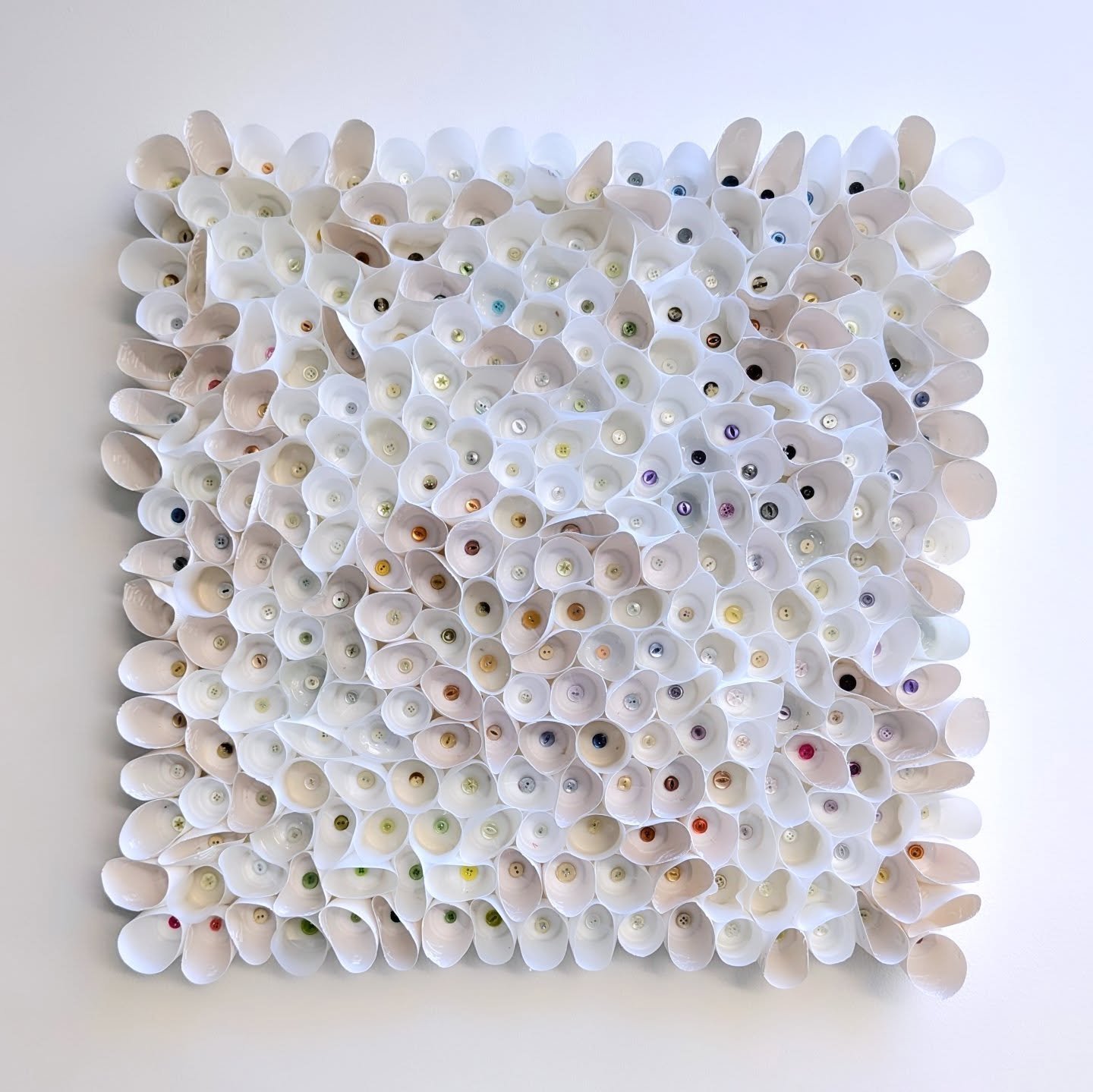 Metabarnacles Too | 2025 | 66x66x8cm | &pound;1200

100% waste: 290 Actimel/Benacol/&hellip; bottles and just as many abandoned buttons.
On display ay Simares, exploring the oxymoron of the plants' existence, becoming in time their own waste and neme