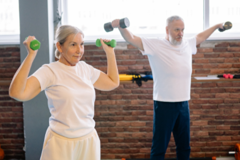 two people lifting weights