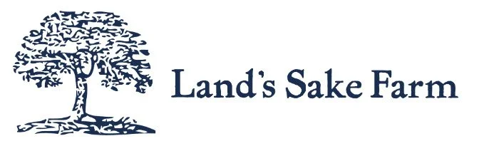 Illustration of a stylized tree and the text "Land's Sake Farm" in blue lettering.
