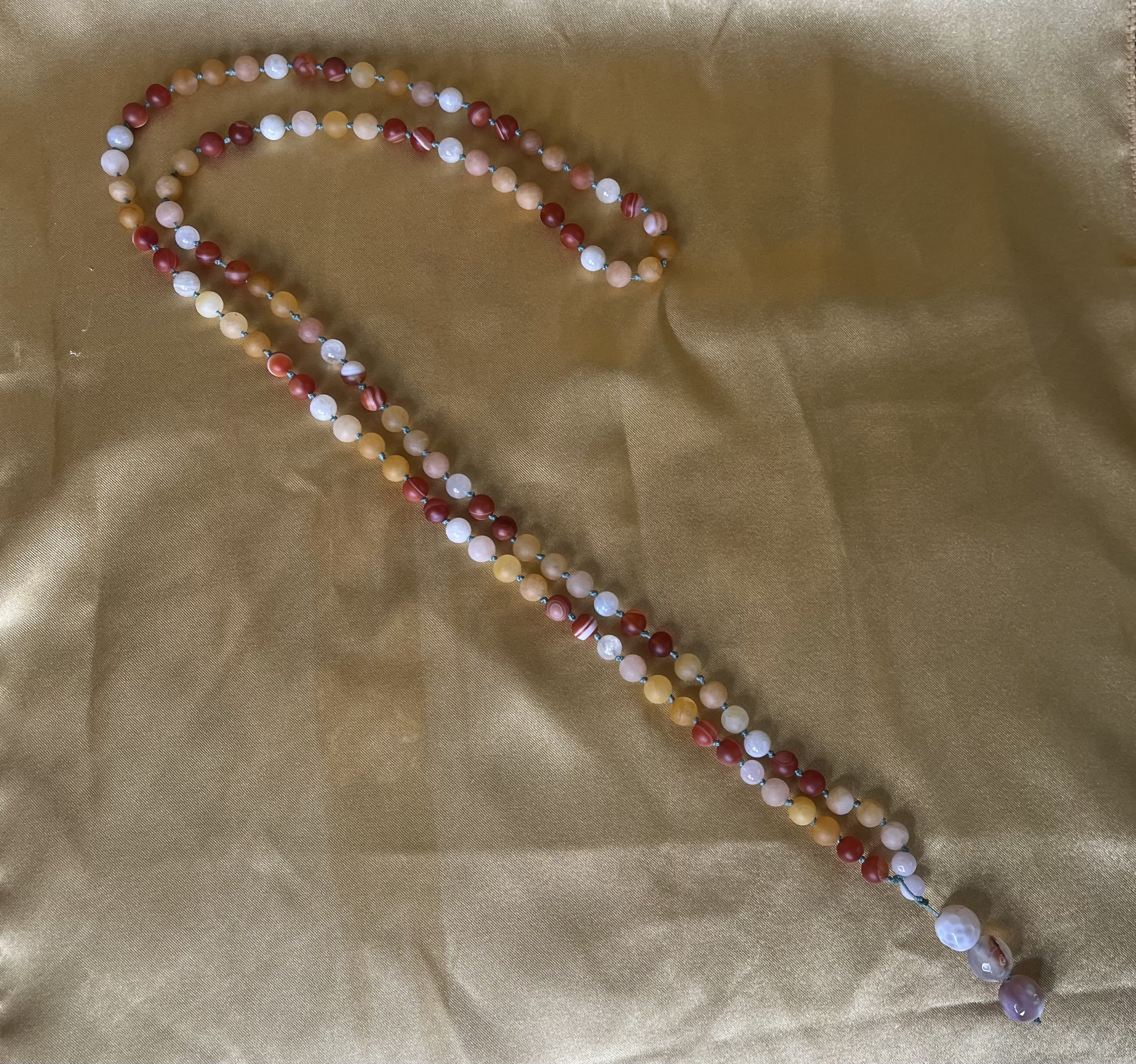 Red, Orange, and White Mala Necklace