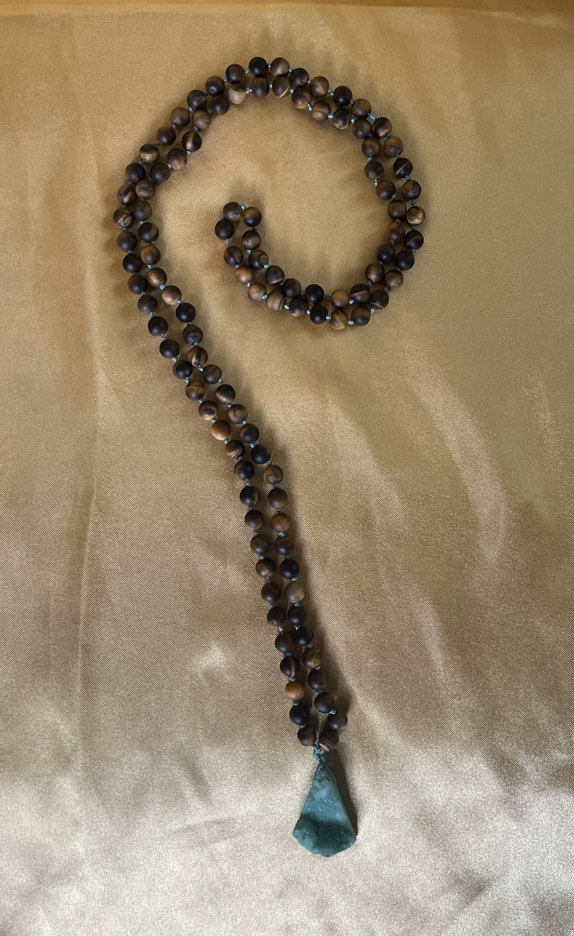Brown Beaded Mala with Green Stone