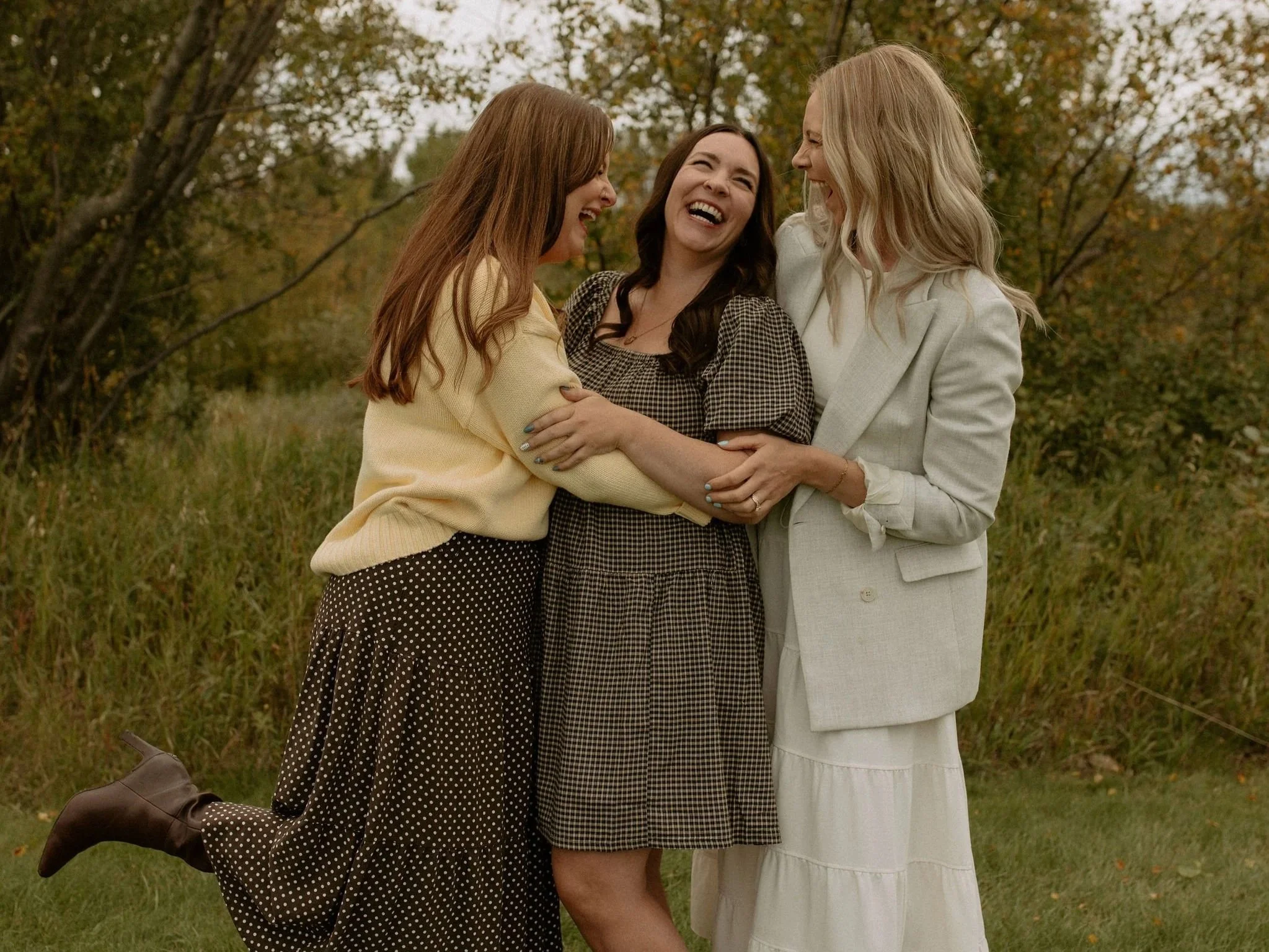group of women on a couch talking to a therapist