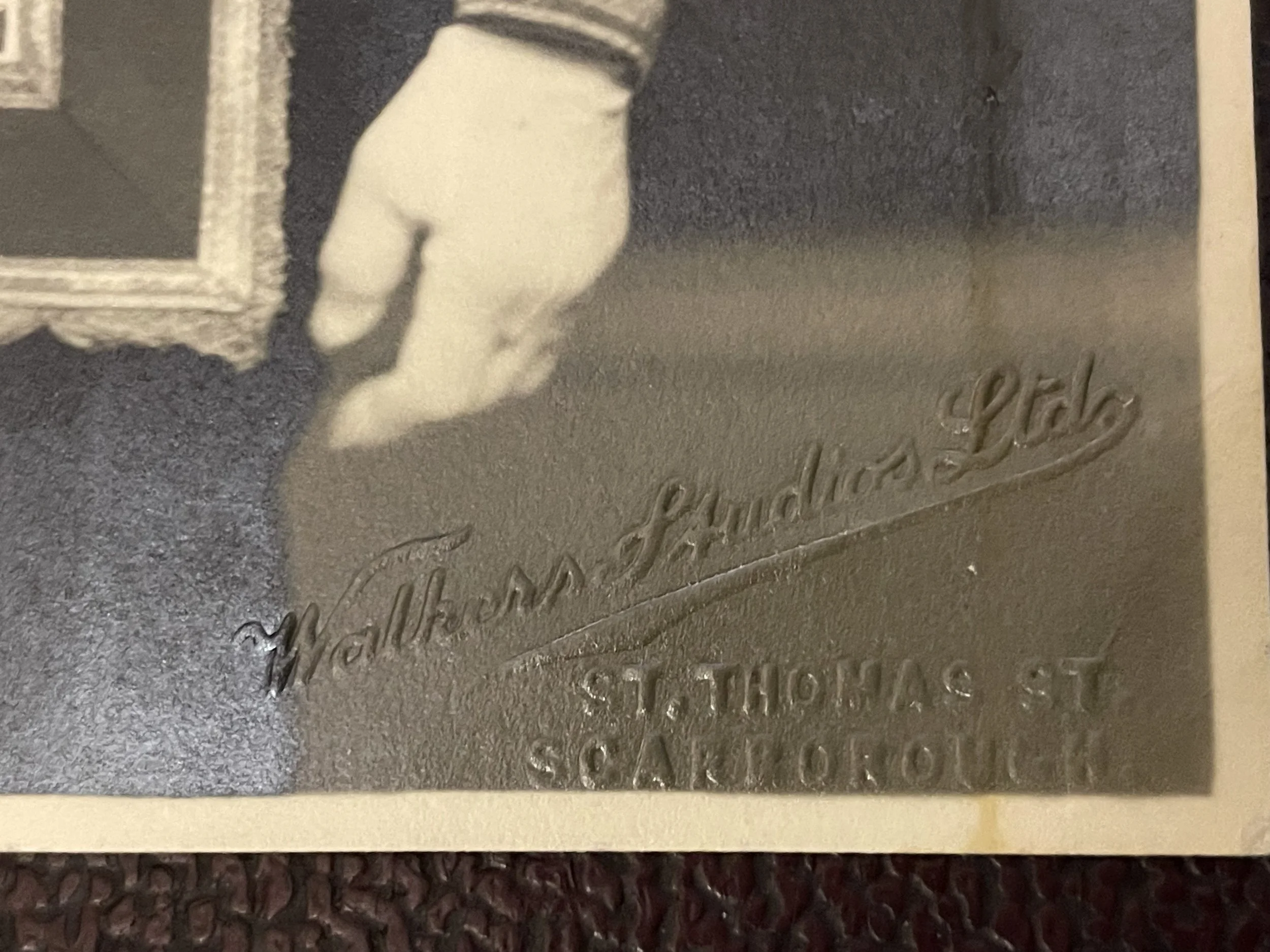 Detail of photograph showing embossed name, Walkers Studios Ltd, Scarborough