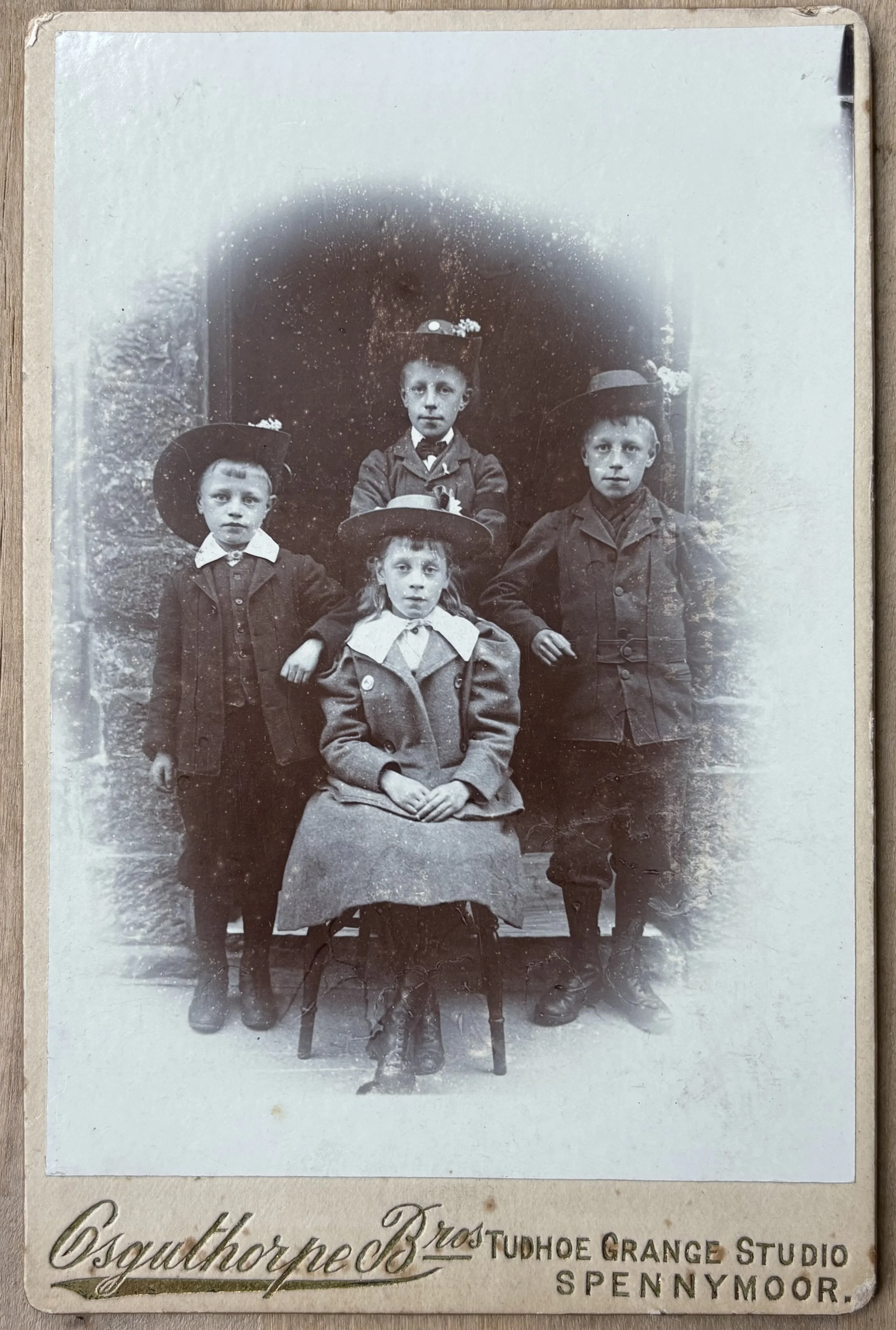 Cabinet Card portrait of four unknown children by the Osguthorpe Brothers photographers of Spennymoor