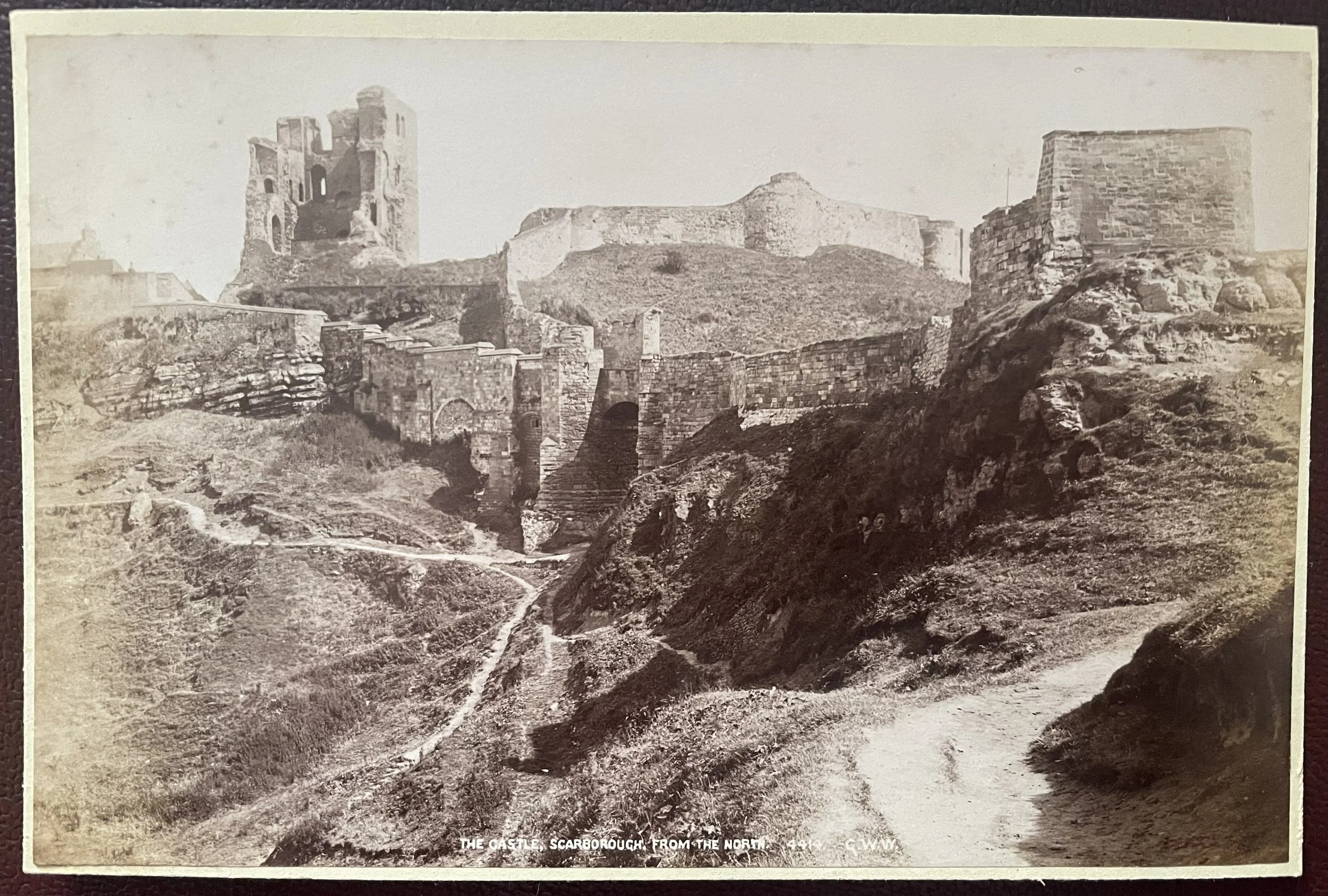 Scarborough Castle, a ruined castle on a hill