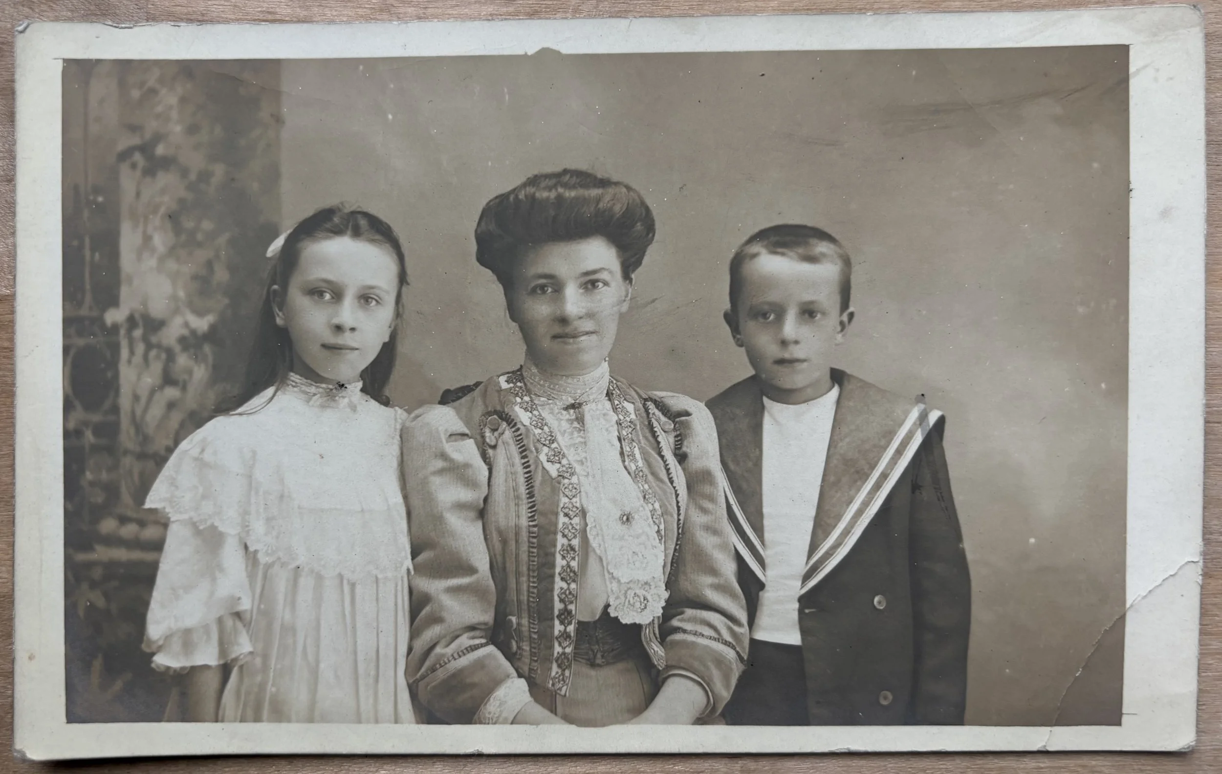 Portrait of a mother and her two children, one in a sailor suit, by Scarborough Photographer Joseph Ernest Truefitt