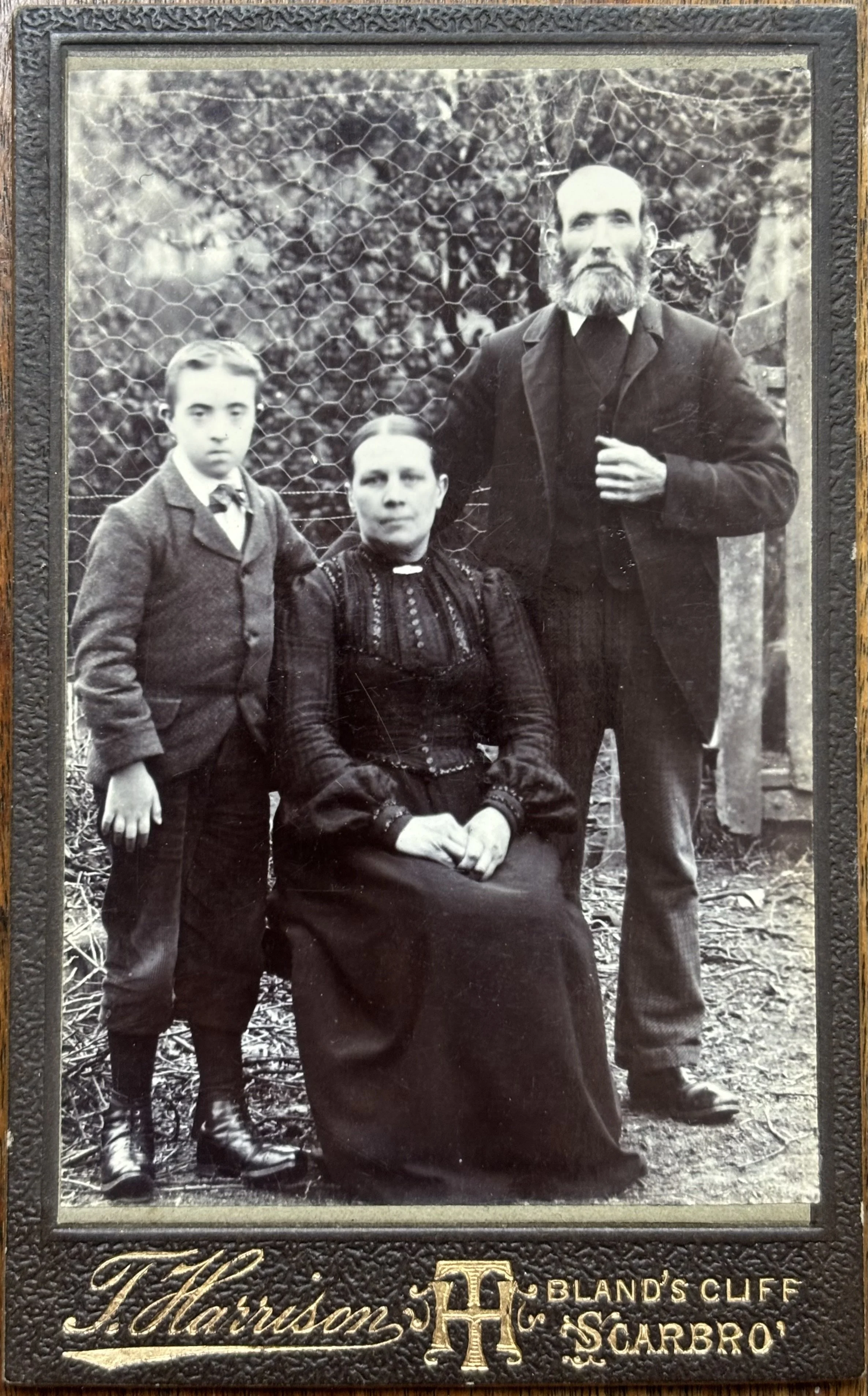 Portrait of an unknown family outside by Scarborough photographer, Thomas Harrison