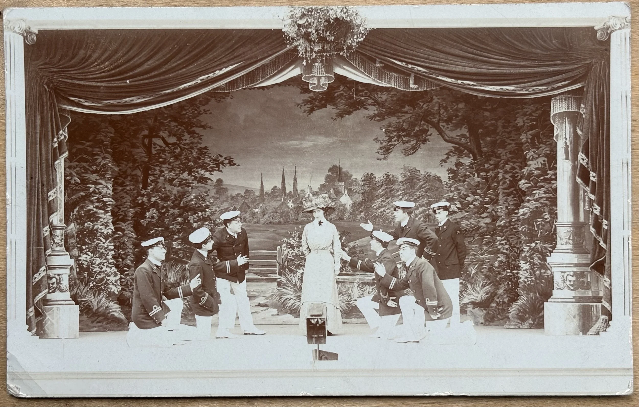 Photographic postcard showing a scene from an unknown theatre play, 1910, by Scarborough Photographer Thomas Boxell & Co