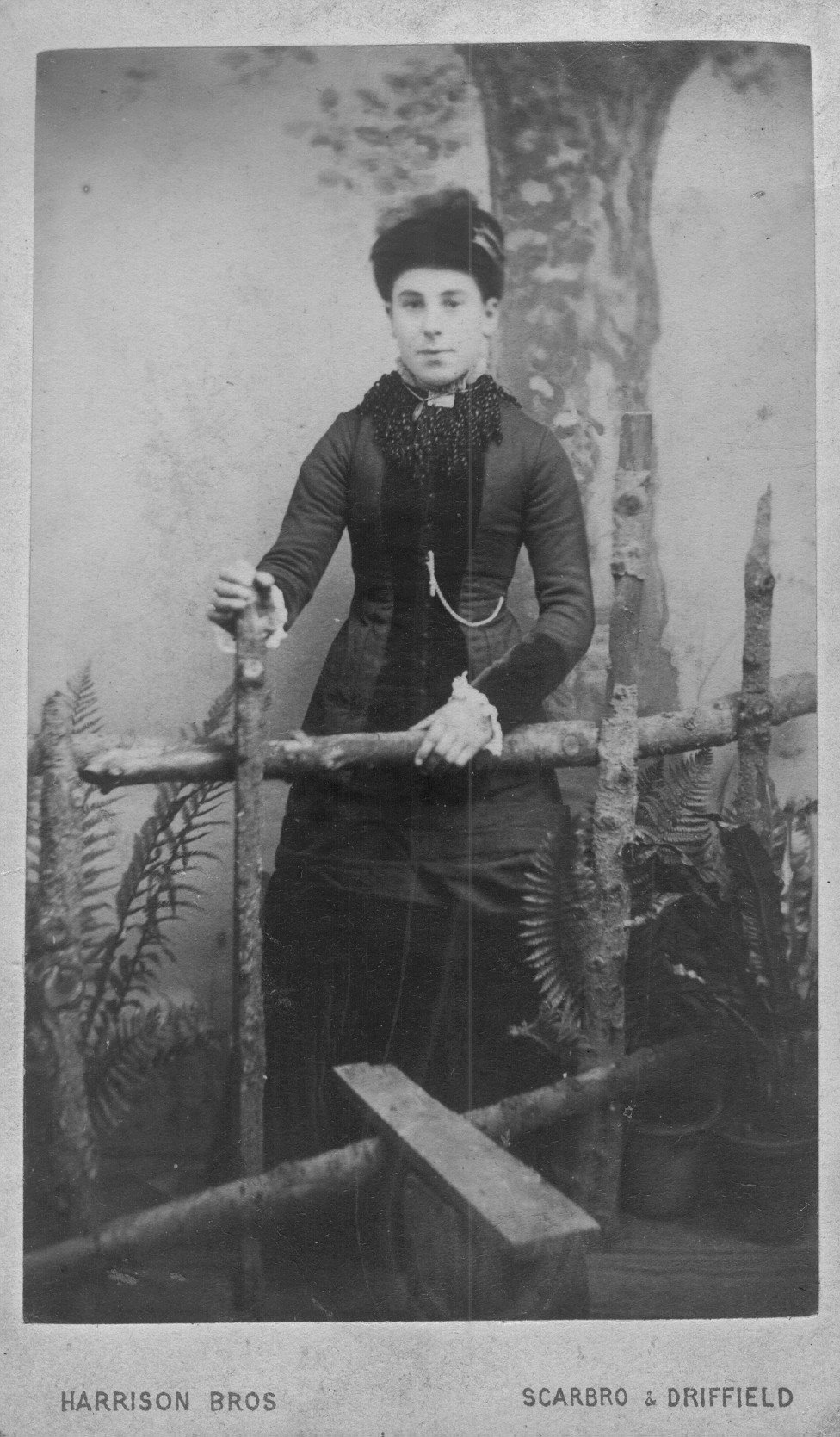 Studio portrait of a woman stood by a style, by scarborough and driffield photographers the Harrison Brothers
