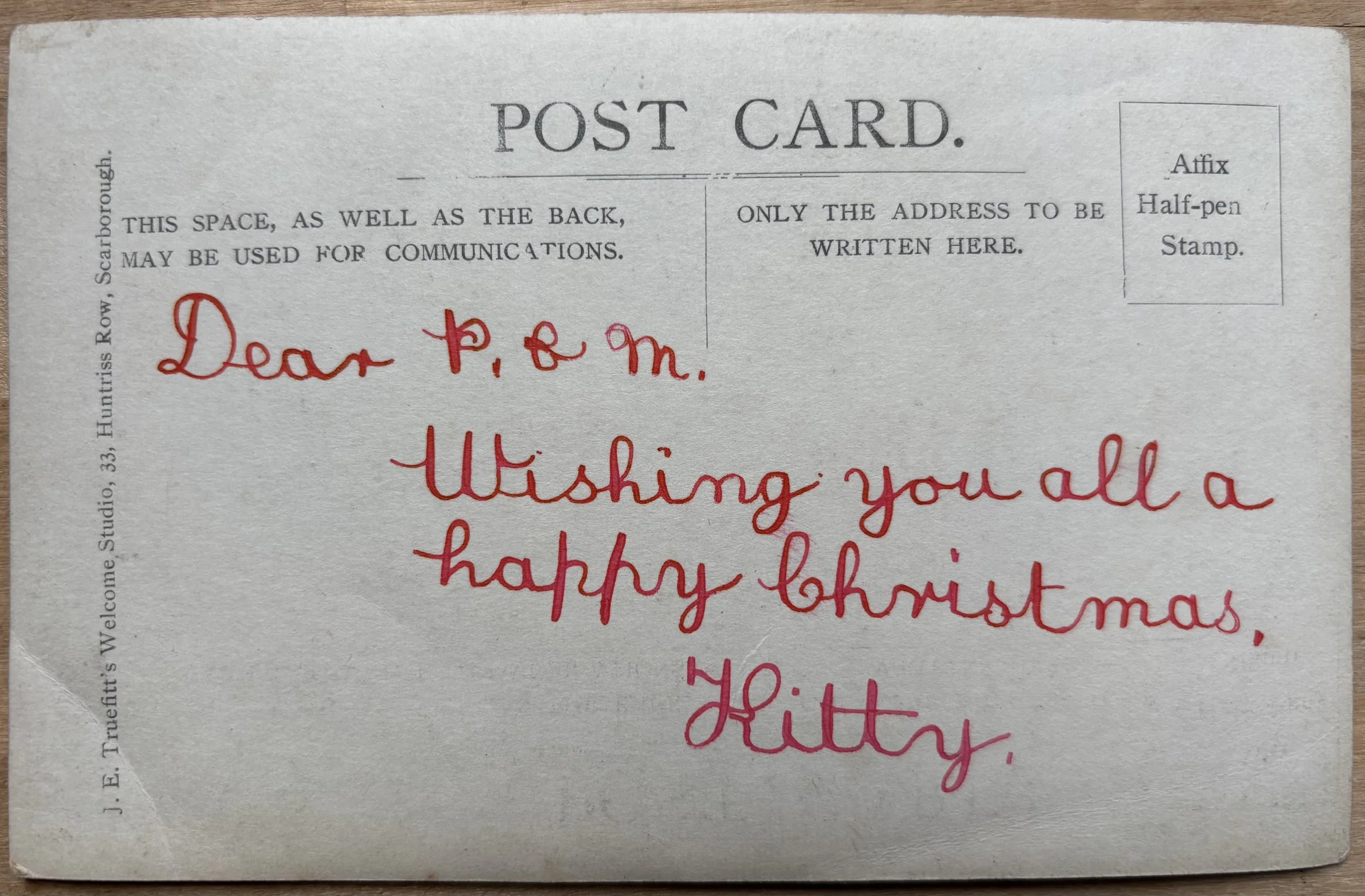 Back of a postcard portrait by Joseph Ernest Truefitt, Scarborough photographer, Christmas message, Edwardian