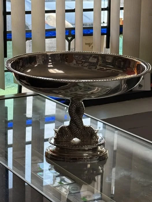 Dive into nostalgia with this vintage silver-plated fish bowl! 