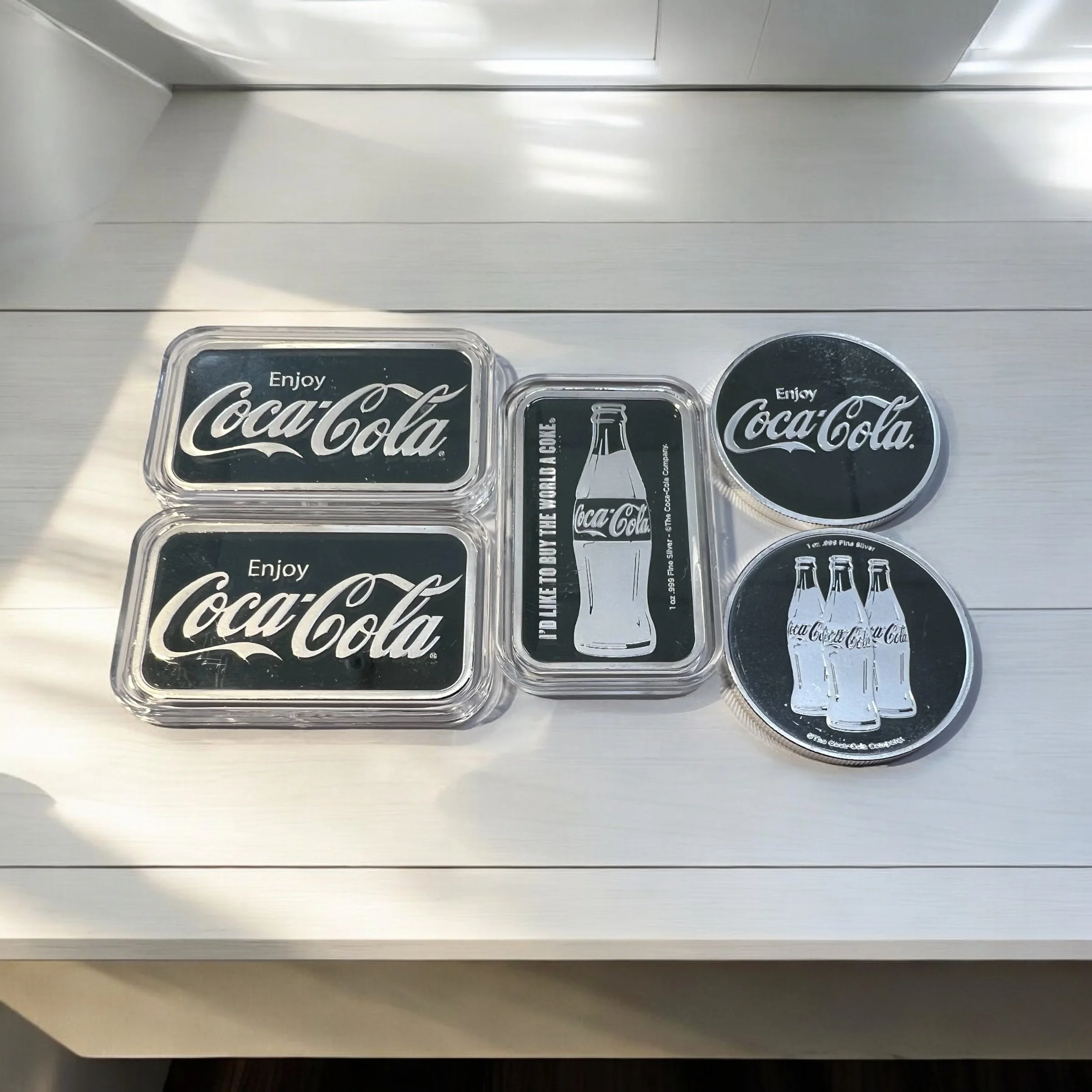 These Coca Cola silver bars and rounds are a touch a fizz for any collection. 