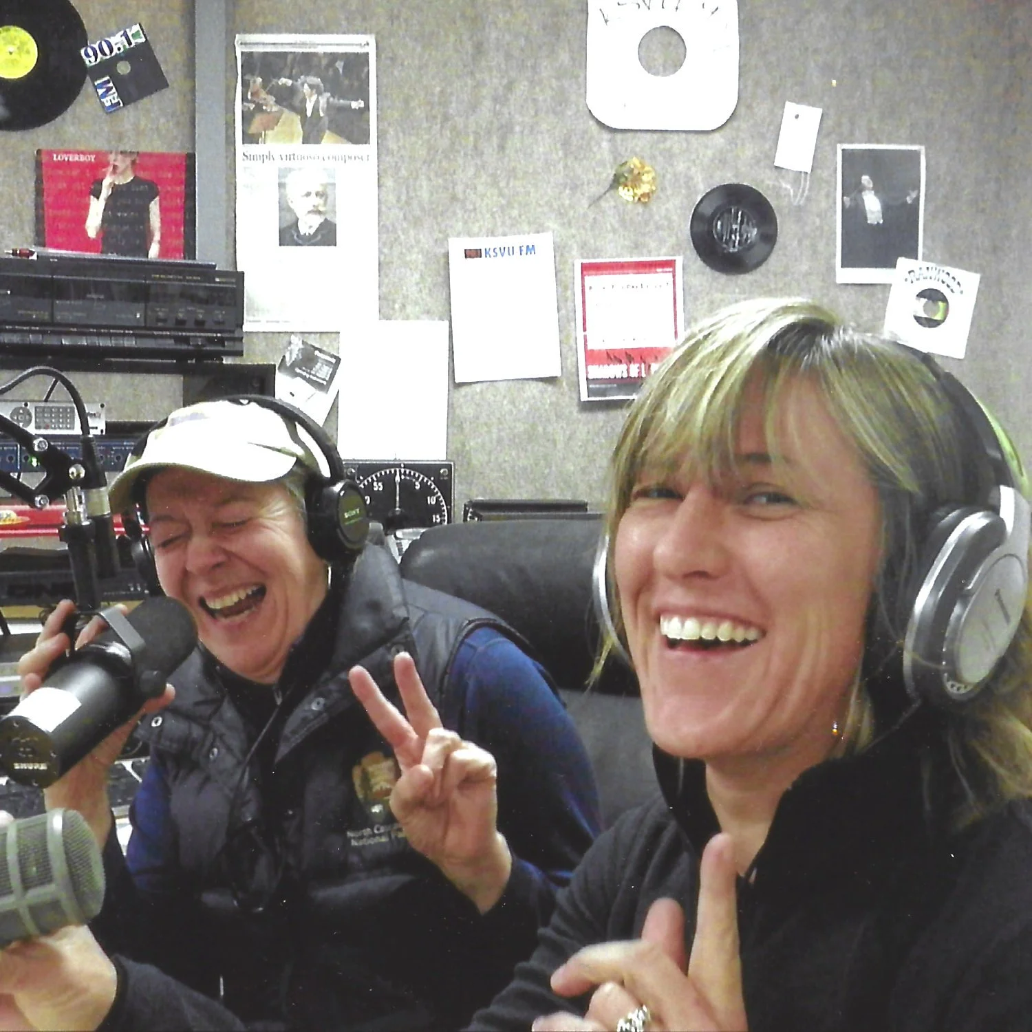 KSVU volunteers laughing while on the air.