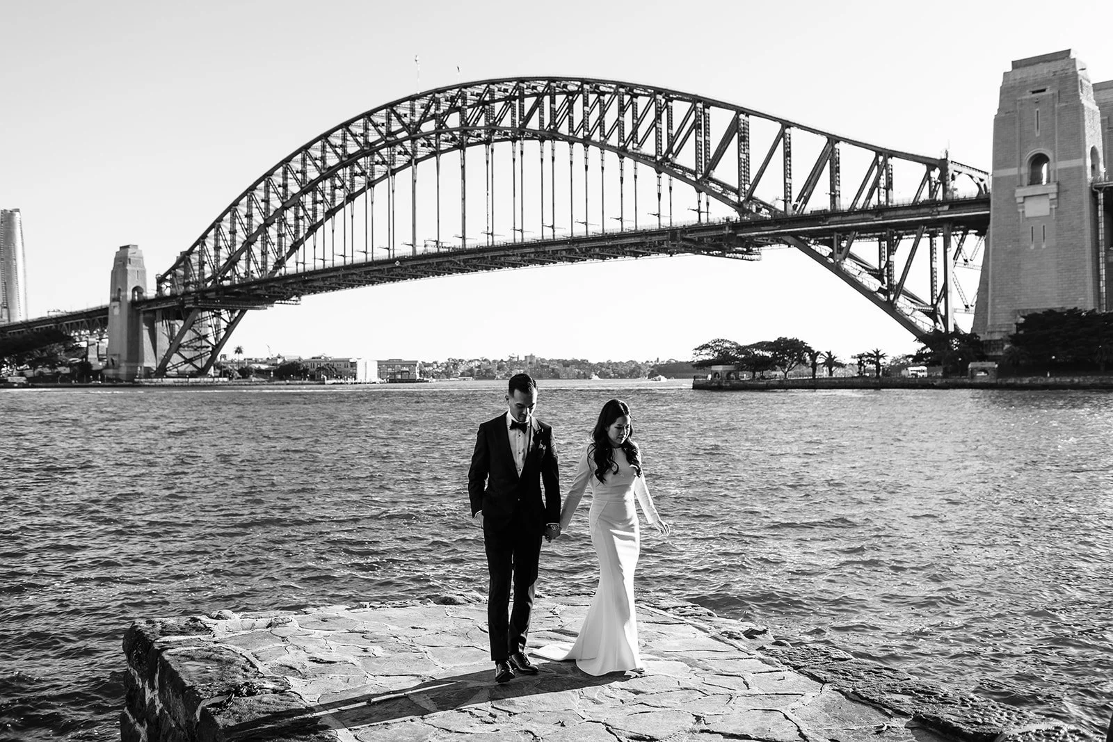 Bride and groom at Lachlan Wilson’s Lookout with the Sydney Harbour Bridge in the background