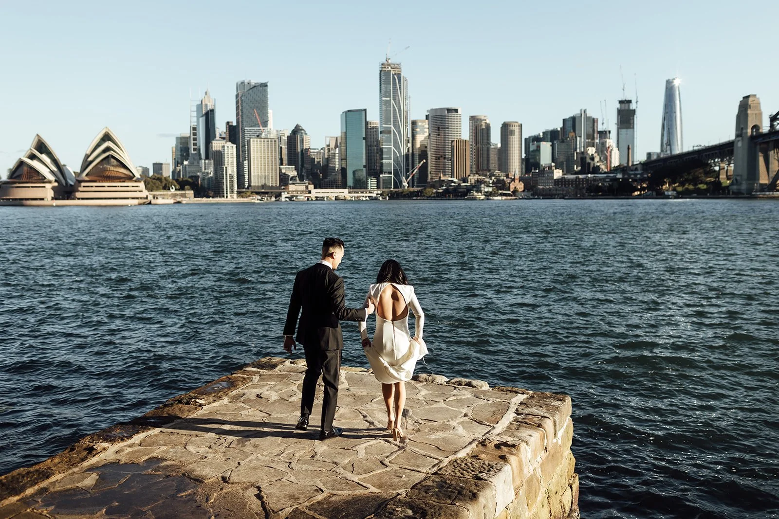 Bride and groom at Lachlan Wilson’s Lookout with the Sydney Opera House in the background