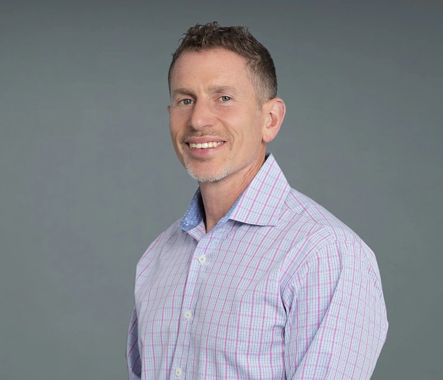 Dr. Hugh Gilgoff, founder and president of Housecalls Tutoring, smiling in a professional headshot