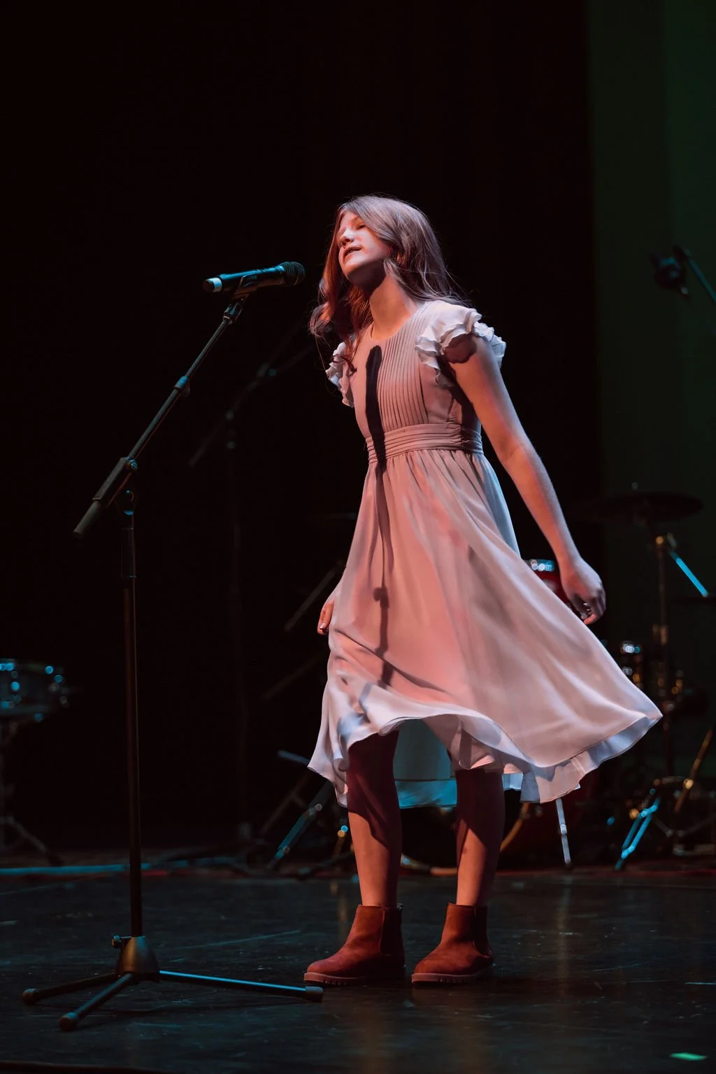 Student singing at a Learn Music Live recital in Davidson, NC