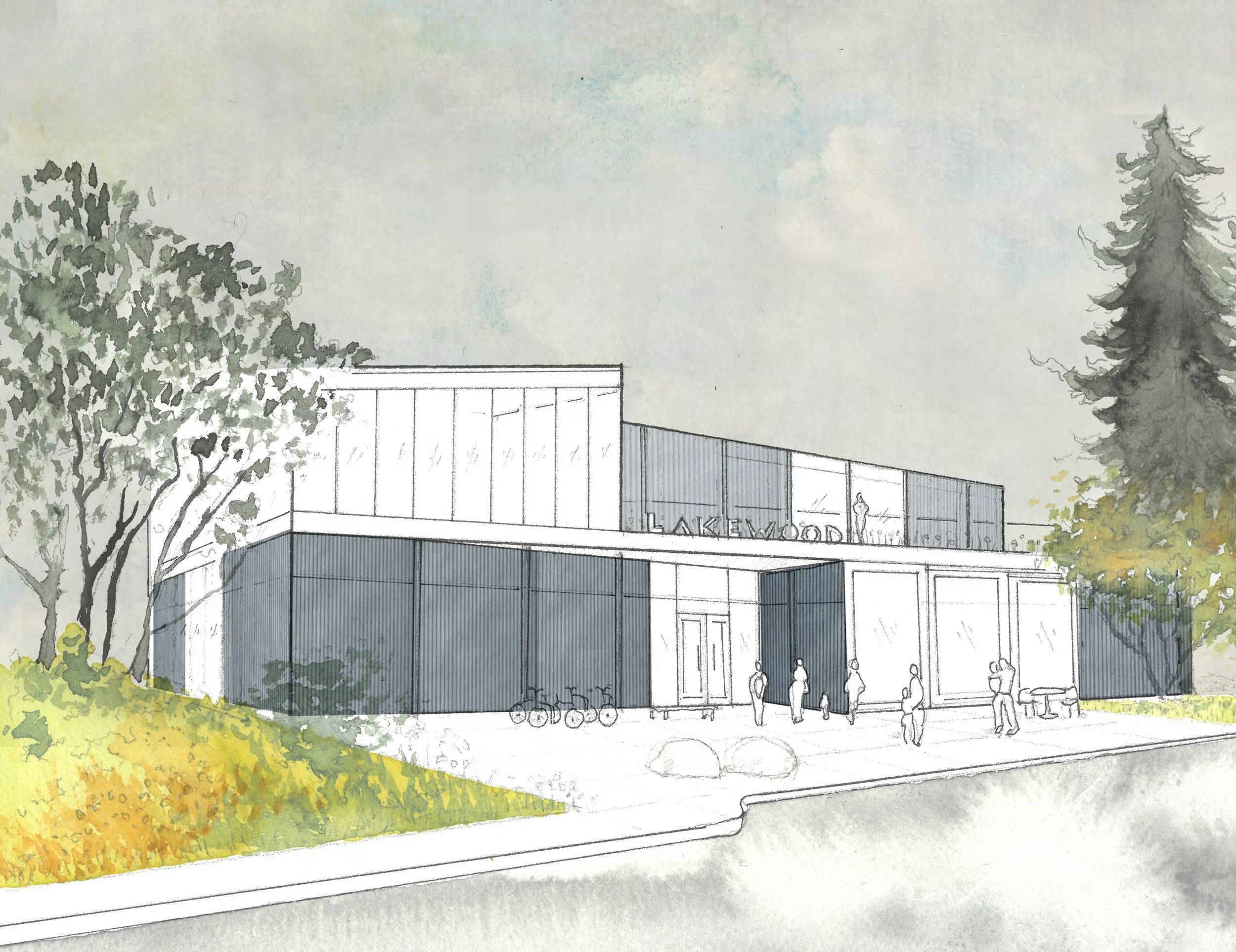 Modern dark gray three-story building on a residential corner with large windows, surrounded by trees and grass, with two people walking on the sidewalk.