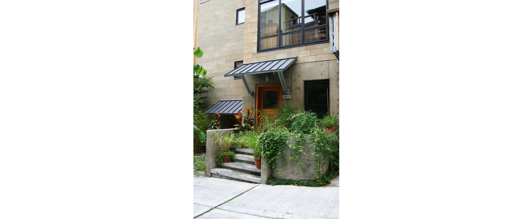 Fremont-Lofts_JA-Multifamily__Photo-by-Ray-Johnston_Entrance.png