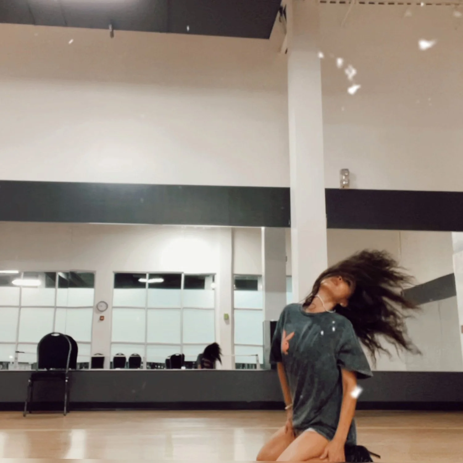 Founder of Belly Heat practicing dance moves, proof it's never too late to start something new