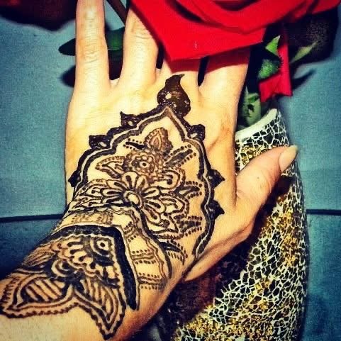 Henna temporary tattoo design in warm brown tone