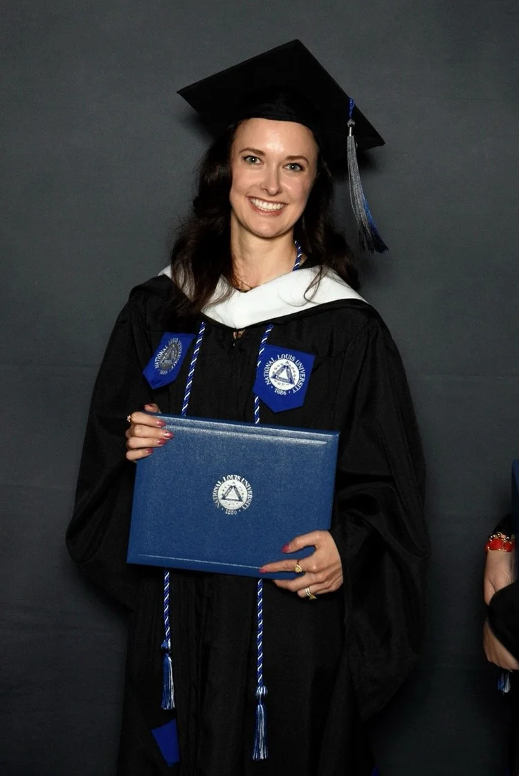 Kelsey Tchamkoriyski at her master's degree graduation in human lactation