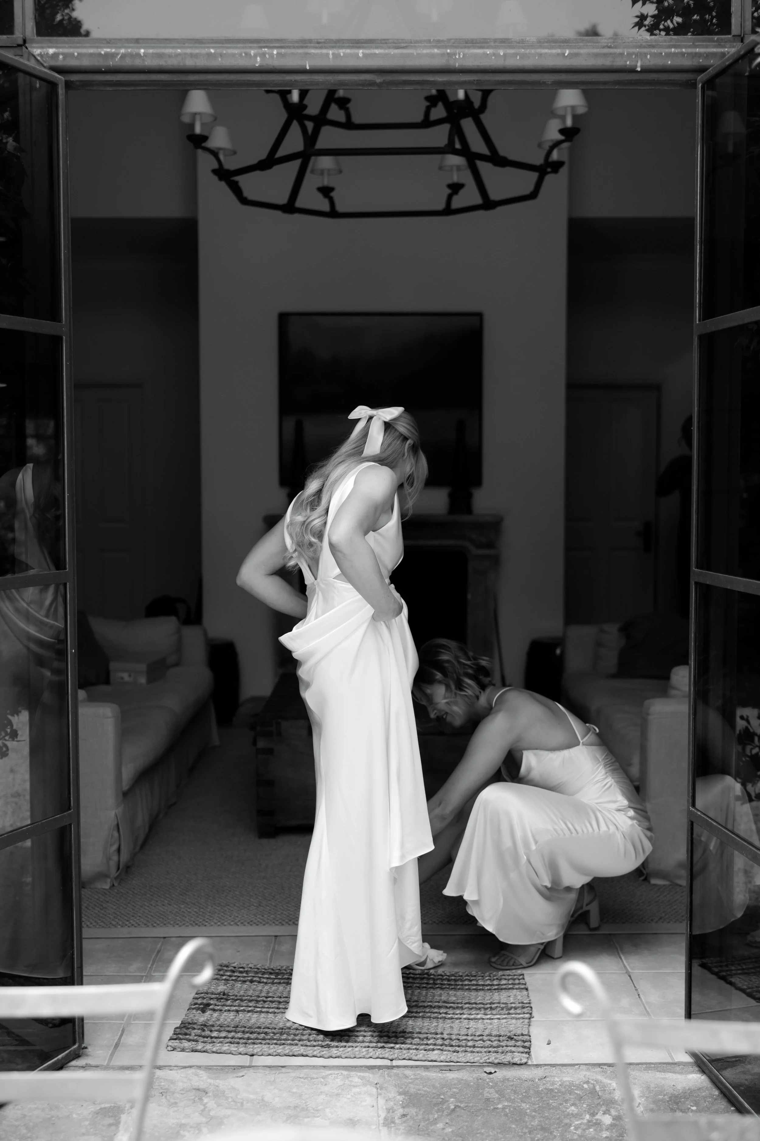 Bride and bridesmaid, getting ready for a wedding at Hunter Valley premium wedding venue Redleaf Wollombi