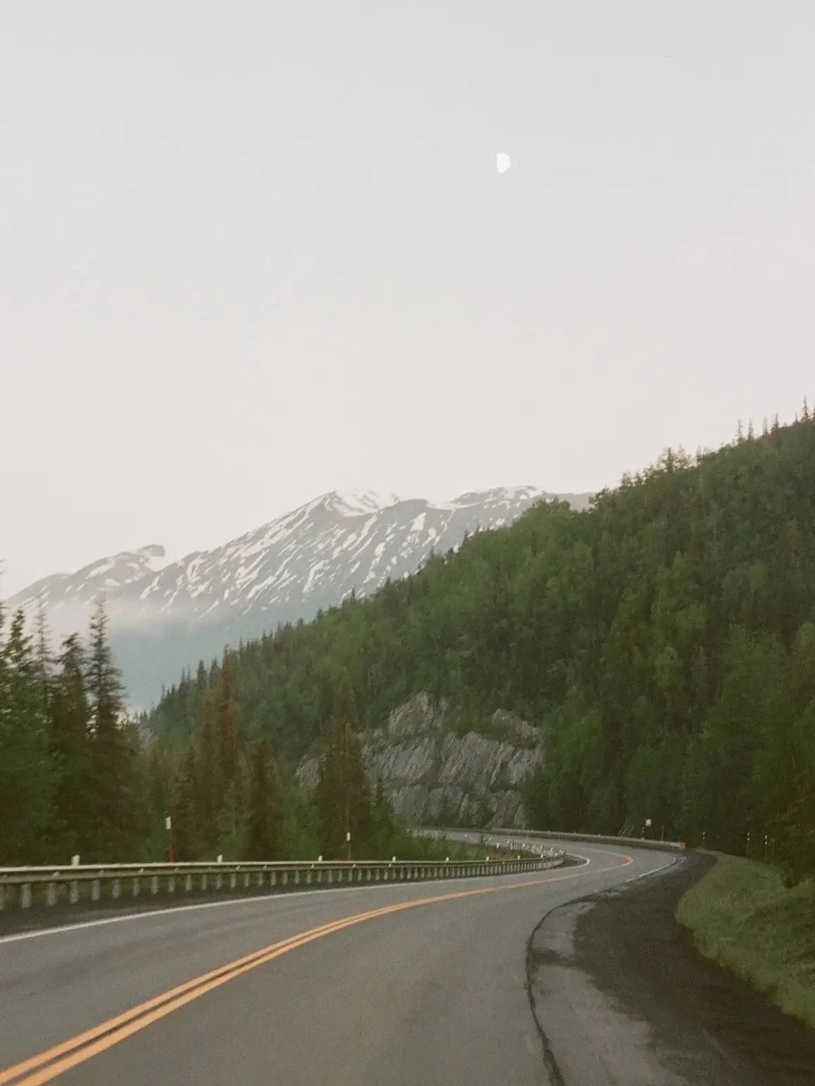 Passenger princess views of the mountains 🏔️ the first photo was taken at ~ 1 am just a few days before the summer solstice (tuning in 24 hours of no sleep / travel time 🥲)

🎞️ 1 &amp; 2 Portra 400 and 3 Ektar 100, all on 35mm film 
#portra400 #ek