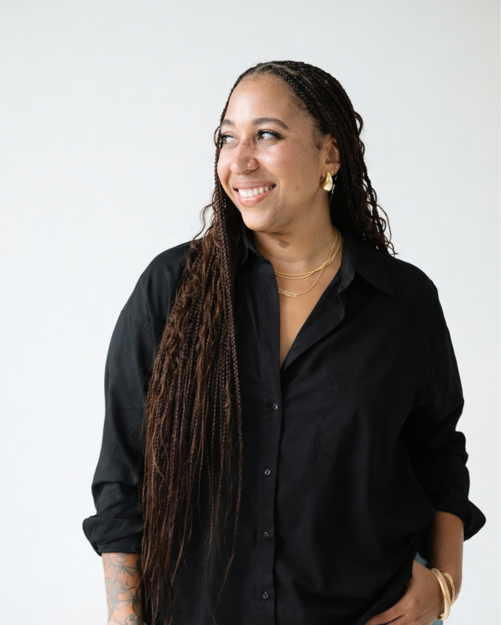 Brittany Johnson, MA, Director of Brand Marketing and Content Strategy. Professional headshot for brand consulting and creative leadership.