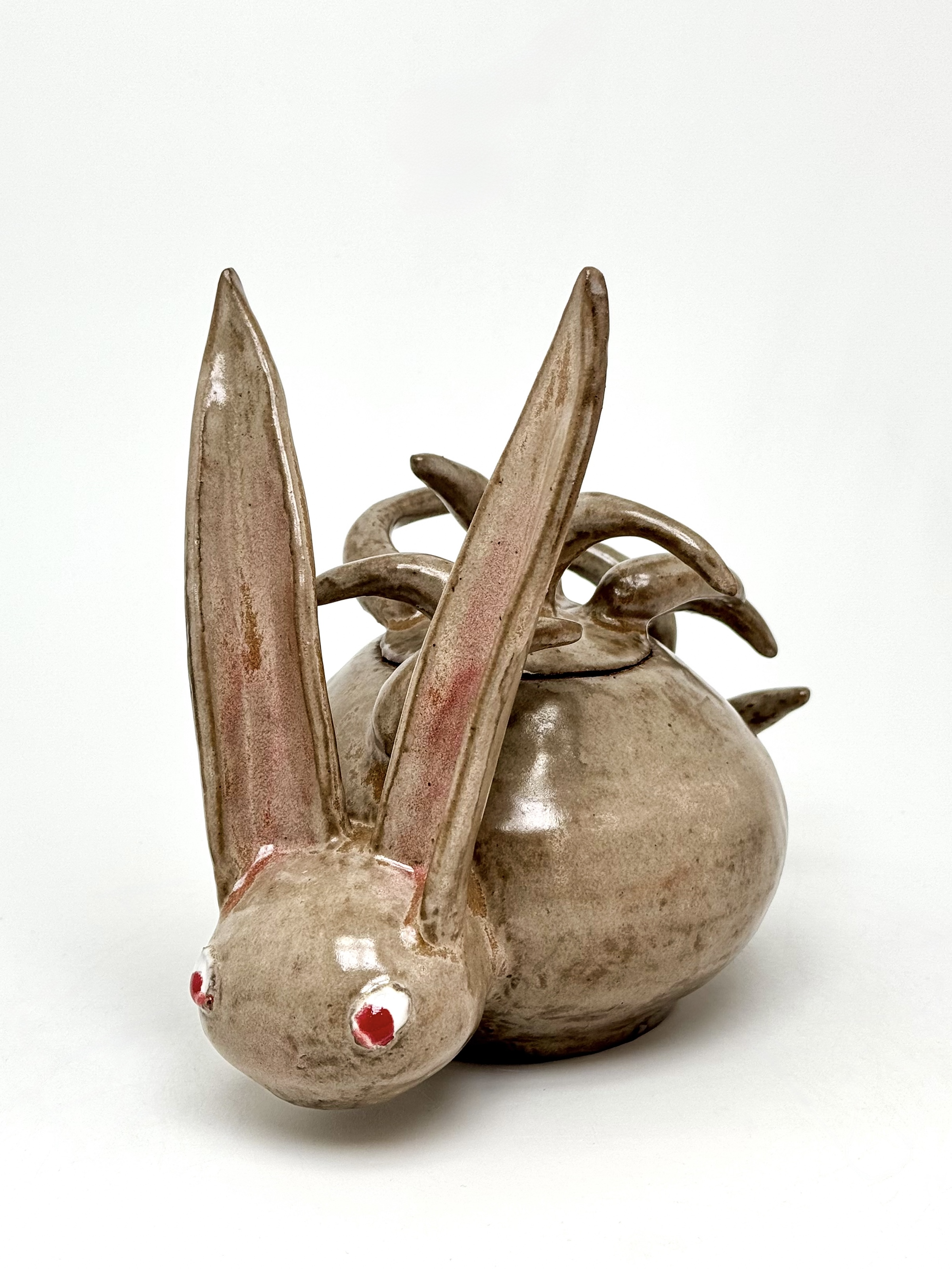  handheld personal pet (pet bunny, pet bunny) , 2025, glazed stoneware, L 20 cm x H 19 cm x W 13
cm