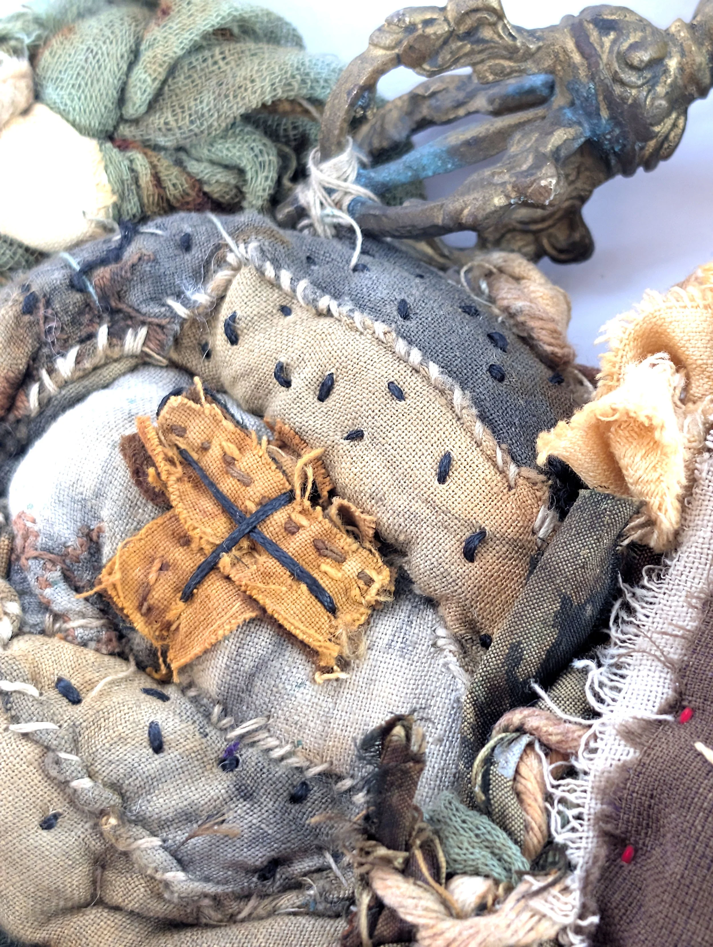 Jenny Davis_Continuance_Textile Heart Sculpture_ 25 x 22cm_2026_side 2 close up.jpg