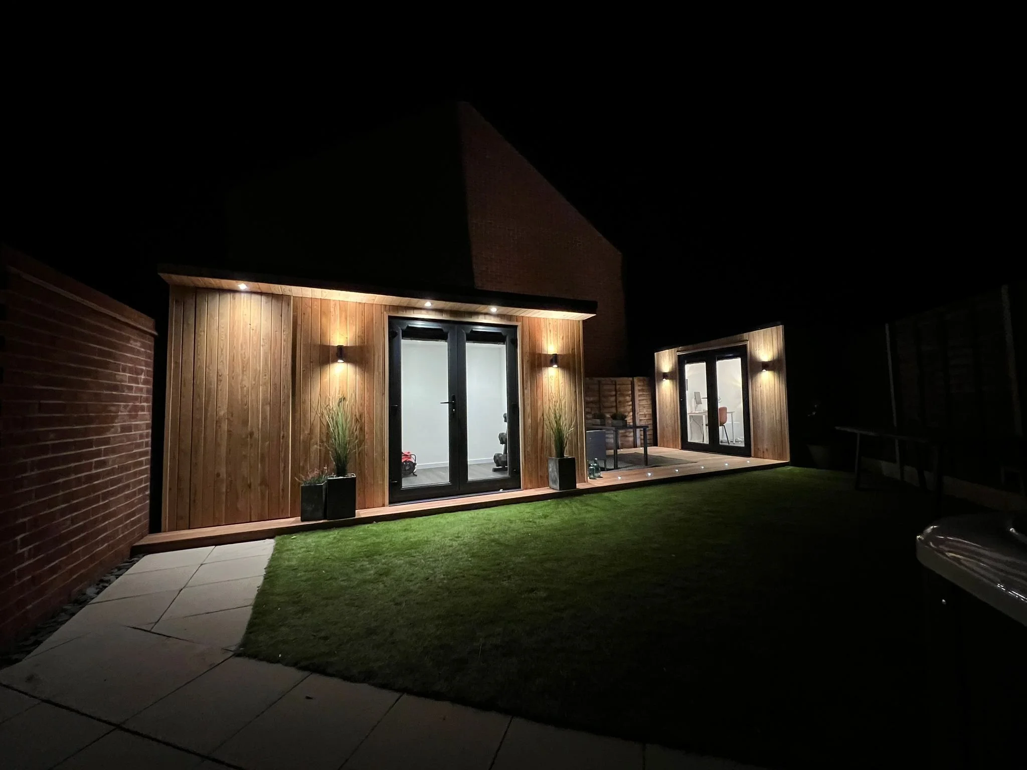 Garden gym with external wall lights in Crowthorne