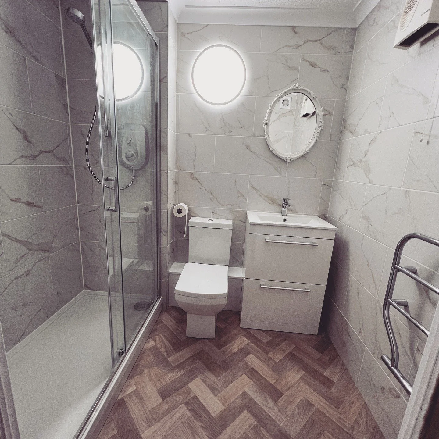 Bathroom Install including, Shower, Toilet, Sink, Lighting, Tiling and Flooring by My Handyman Dave