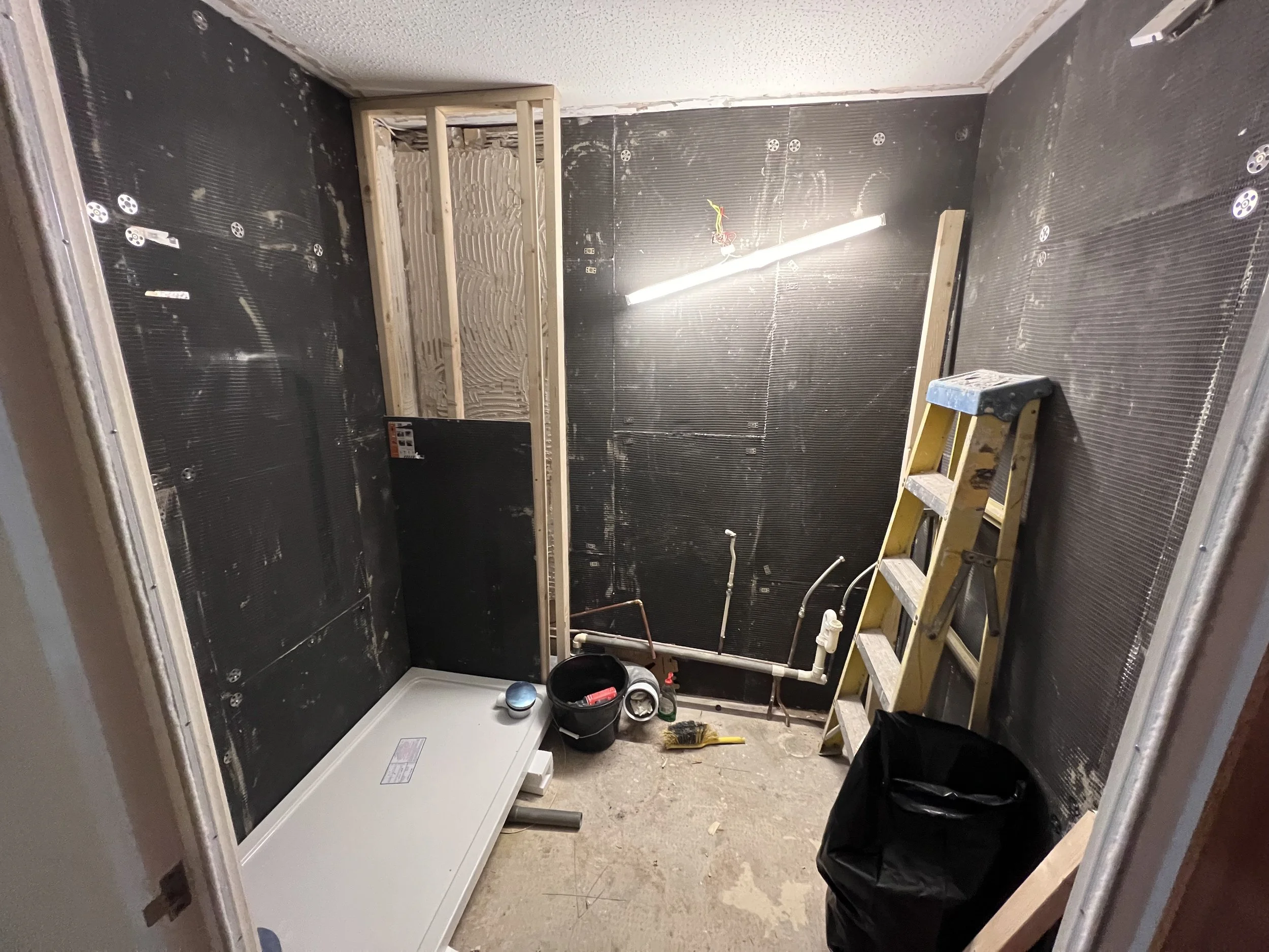 Tile board glued and screwed 