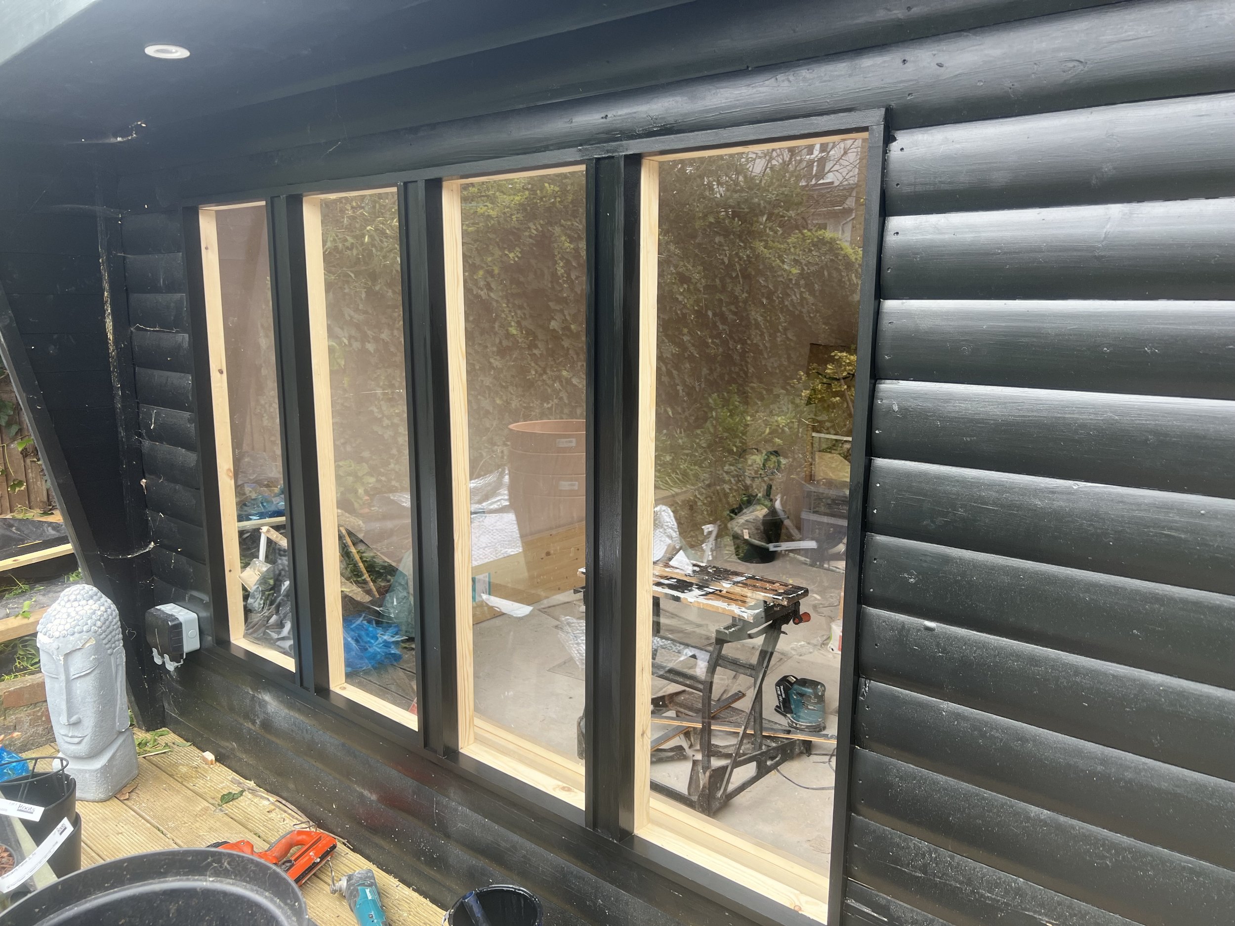 New window frame built and Acrylic sheeting installed 