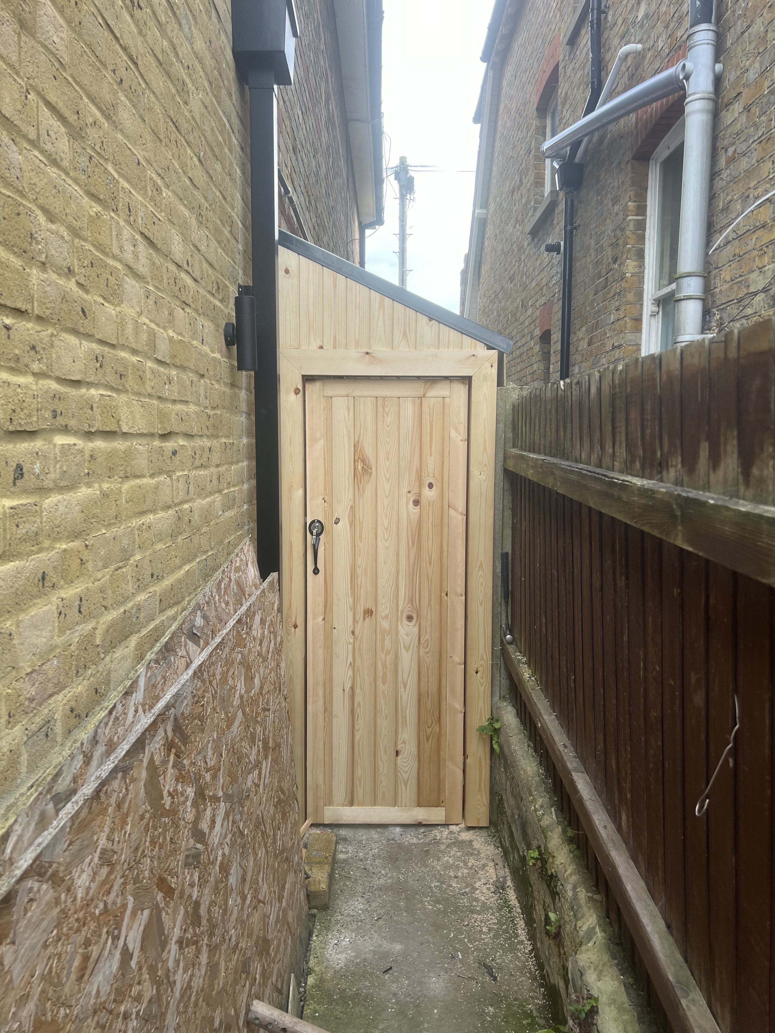 Side Shed made and door made and hung Rear