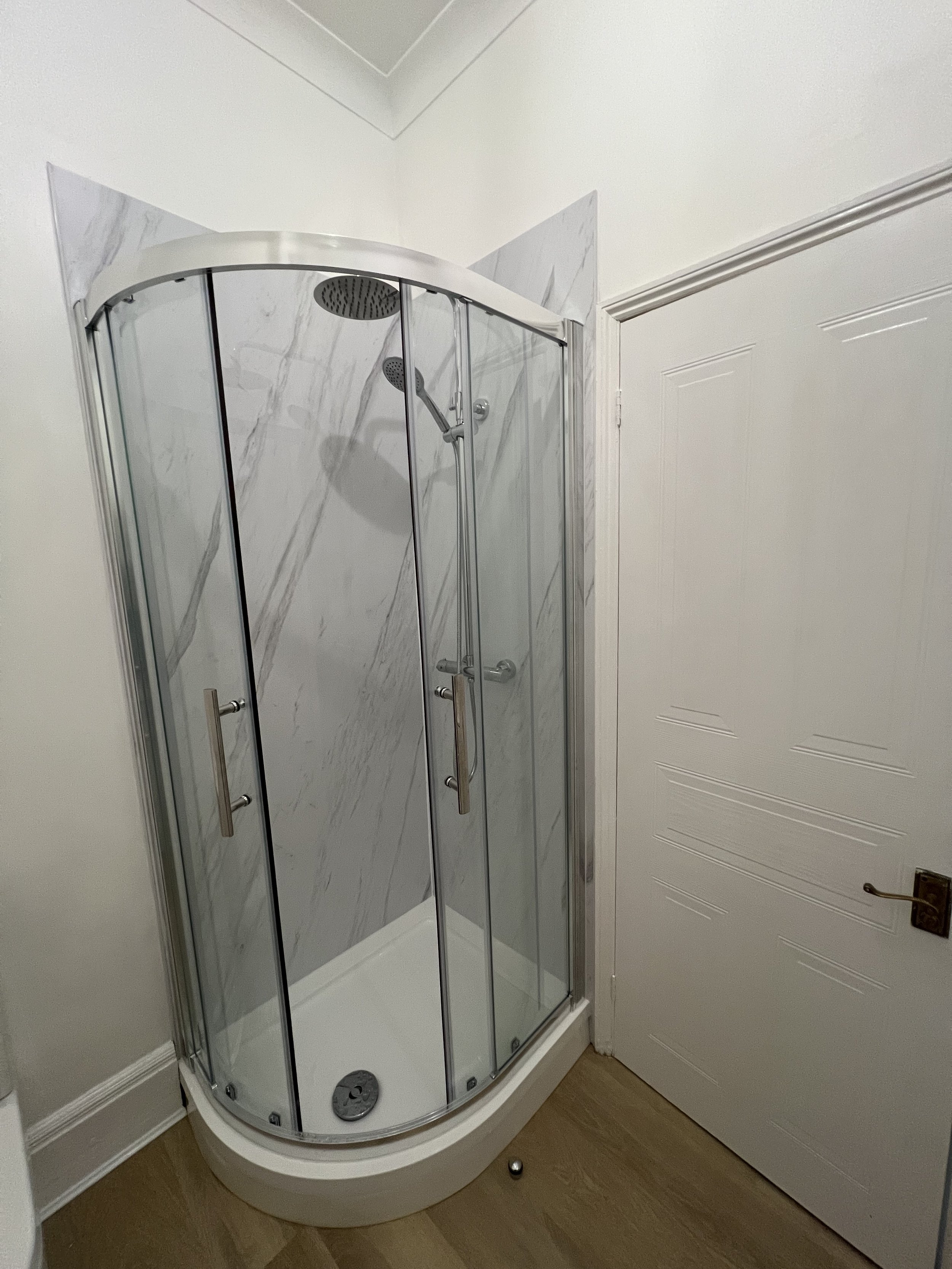 Corner shower installed