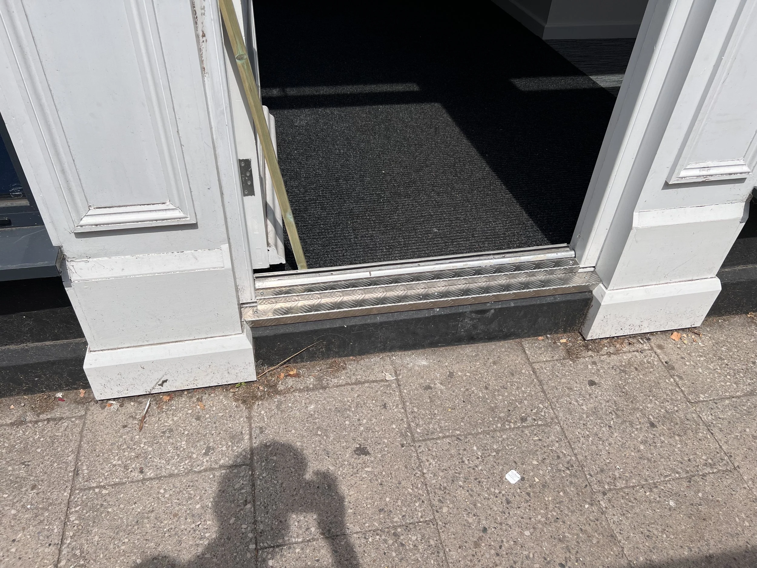 Metal Plate fitted to concrete lip