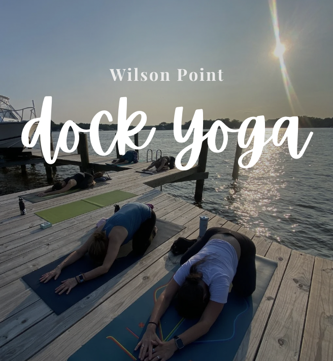 Wilson Point Dock Yoga Title with People in Child's Pose Yoga position on a sunny day on a pier overlooking the water