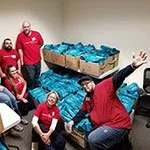 Mott Corporation Health Ambassador Volunteers Prepare 1,000 Bags of Personal Care Items for Wheeler Patients